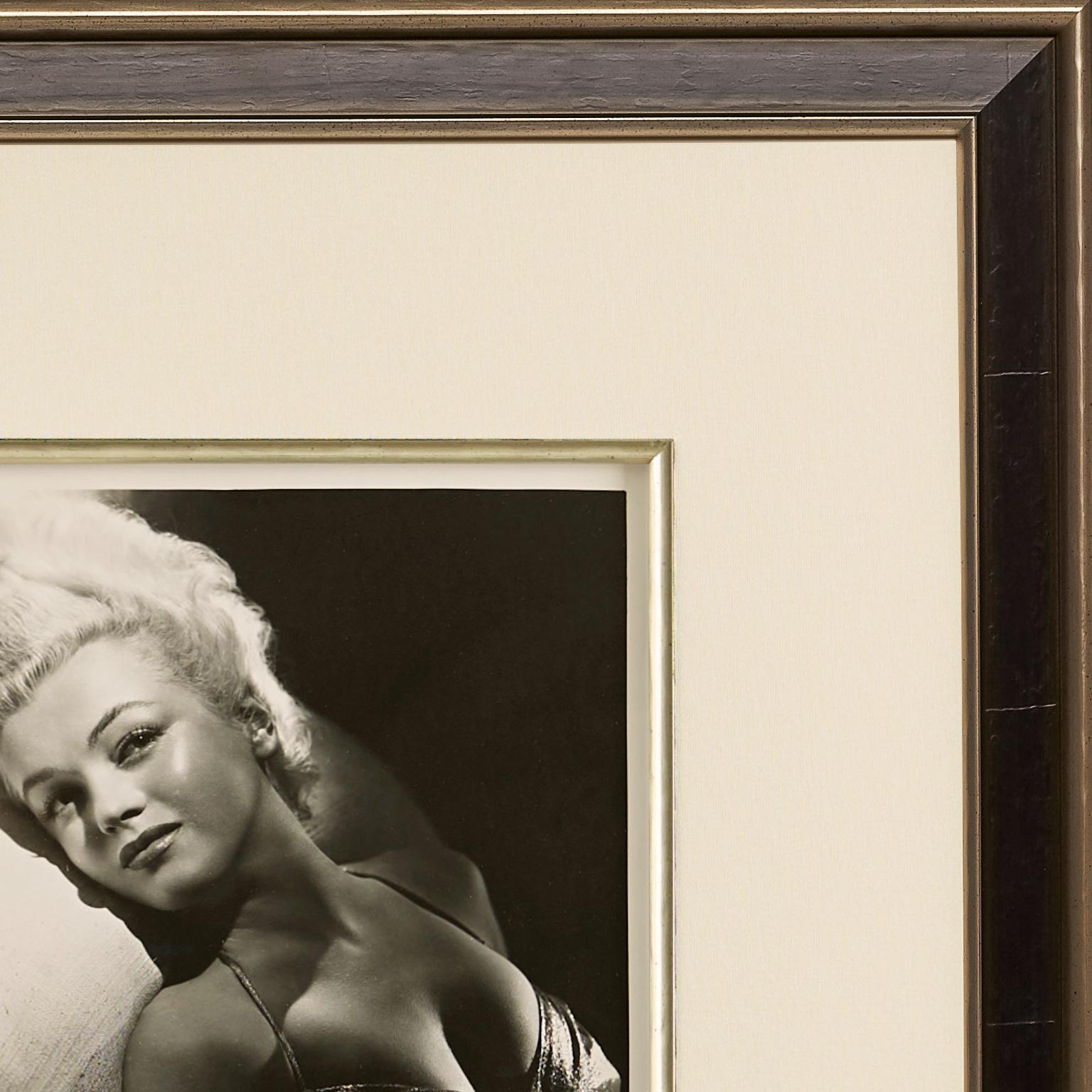 This uniquely angelic print of Marilyn is a vintage original photograph taken by Frank Powolny circa 1950. It measures 10 x 8 inches (25.4 x 20.3 cm) and features the inventory number, 'F999/5/213', in the bottom right corner. Until acquisition, it