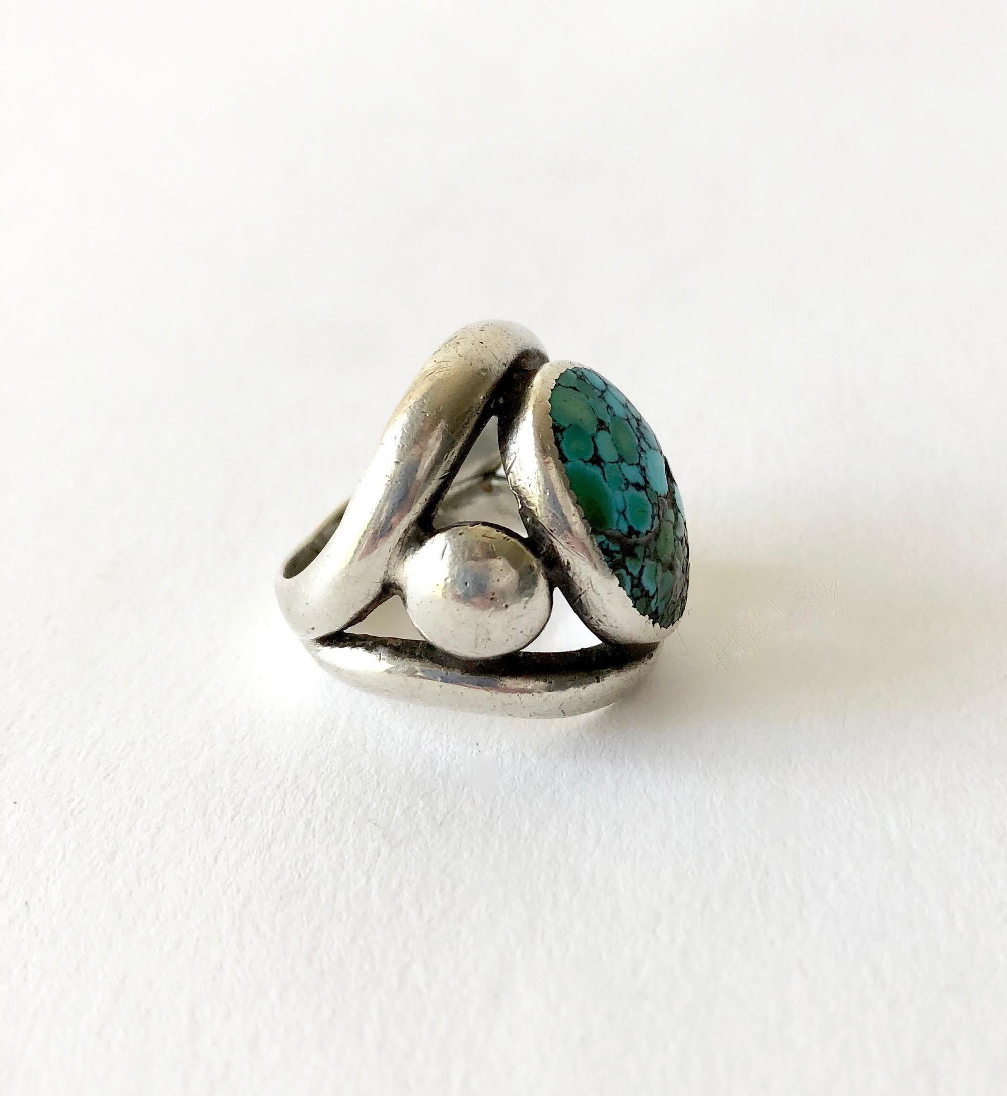 Modernist Navajo style sterling silver and natural #8 turquoise cabochon ring by Frank Patania Sr of Santa Fe, New Mexico.  Ring is a finger size 9 - 9.25 due to its open design.  Suitable for a man or woman and in very good vintage