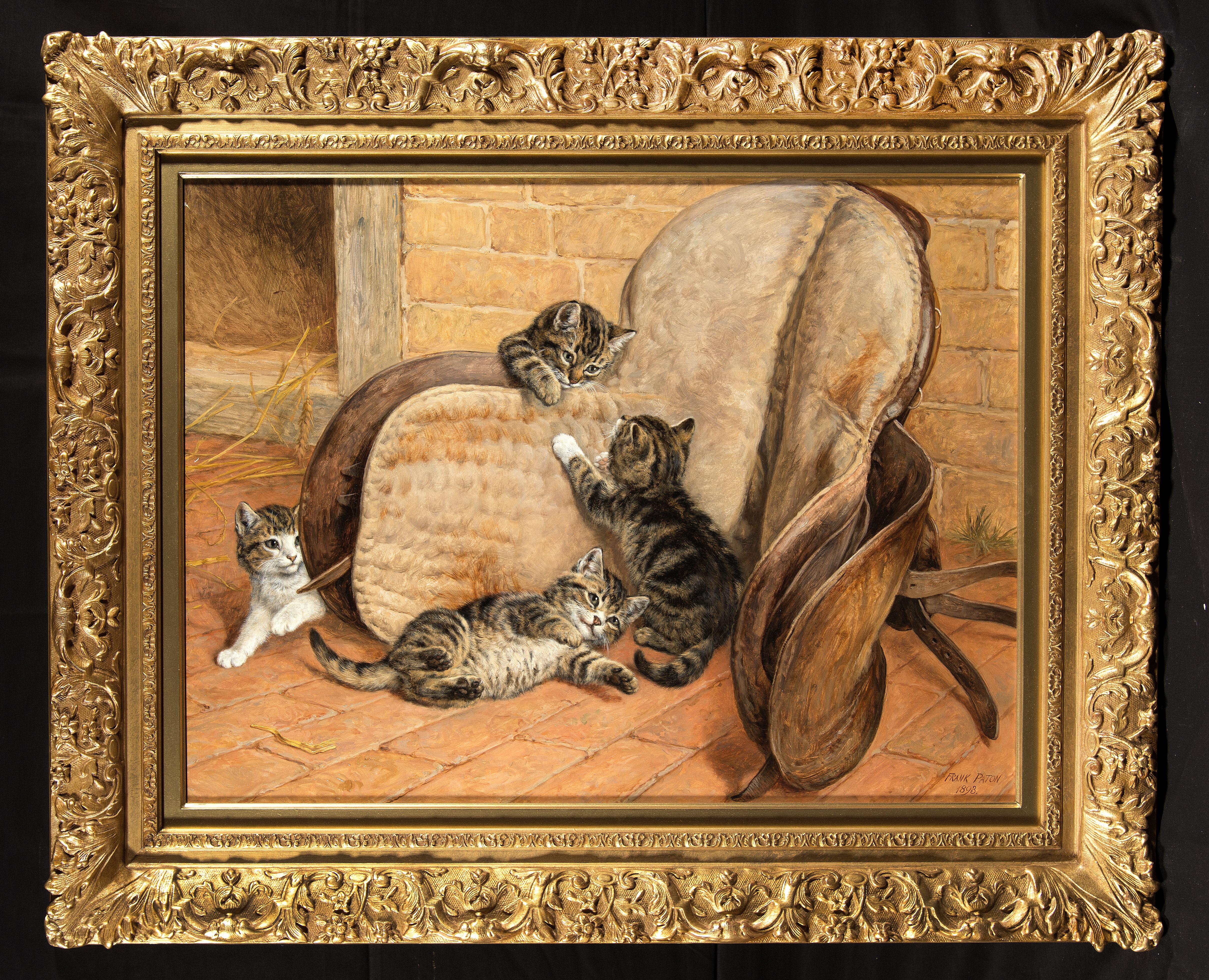 Frank Paton Animal Painting - Kittens Playing Around a Saddle