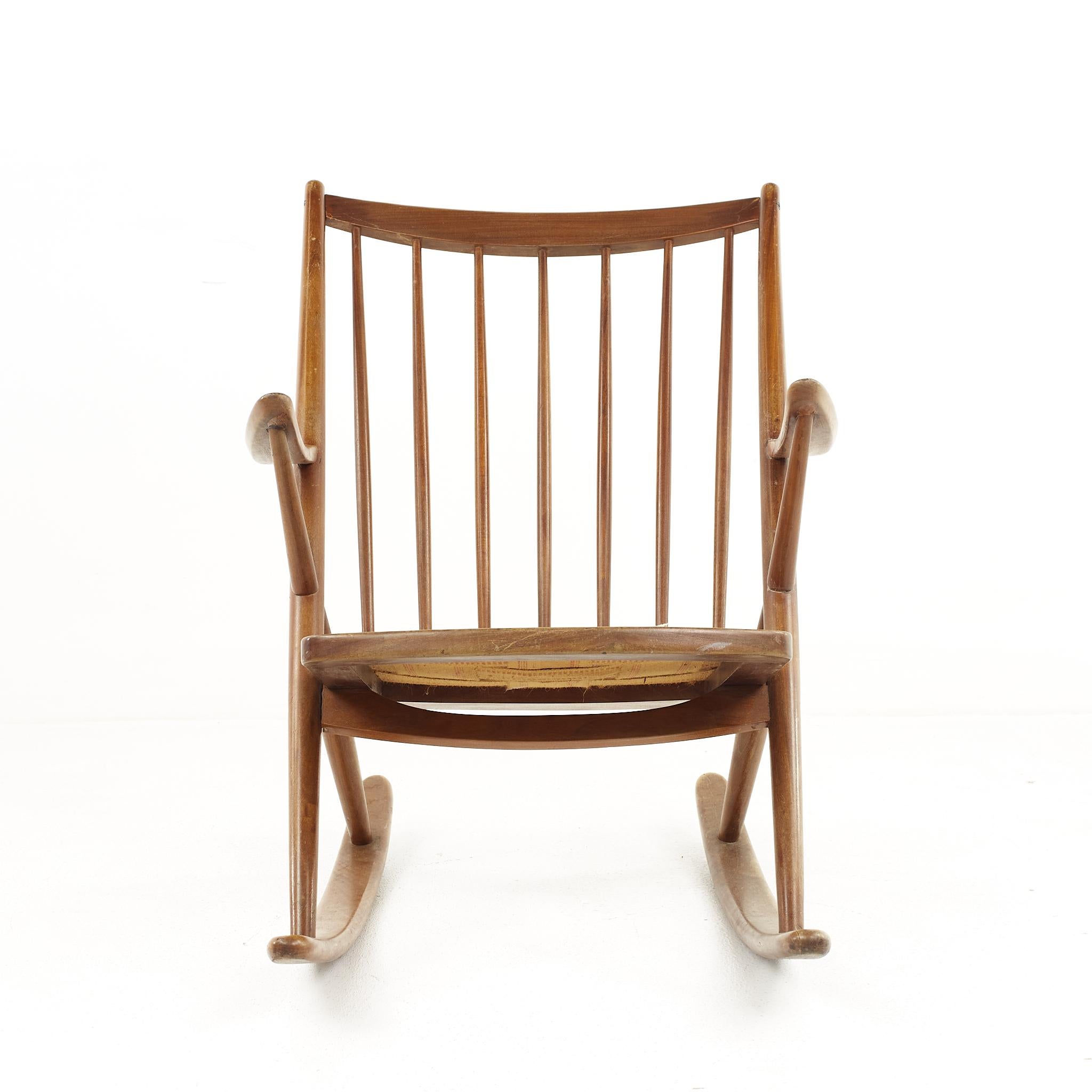 Frank Reenskaug for Bramin Mobler Model 182 mid century teak rocking chair

The chair measures: 26.25 wide x 32 deep x 34.25 inches high, with a seat height of 16 and arm height of 24.75 inches

All pieces of furniture can be had in what we call