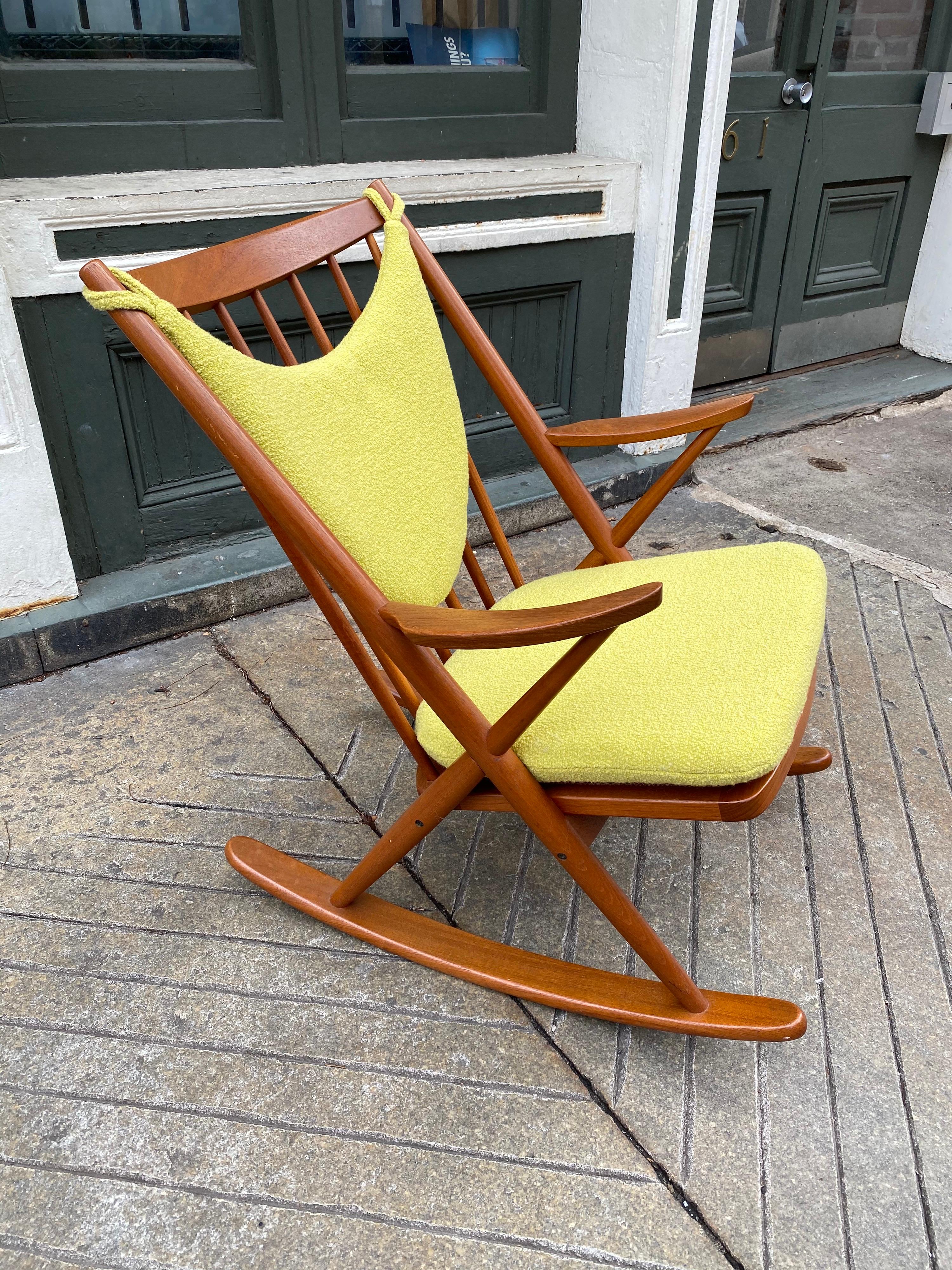 Frank Reenskaug for Bramin solid teak rocker, newly re-upholstered in a nubby pale green fabric. Extremely comfortable and solid! Teak in very nice original condition!