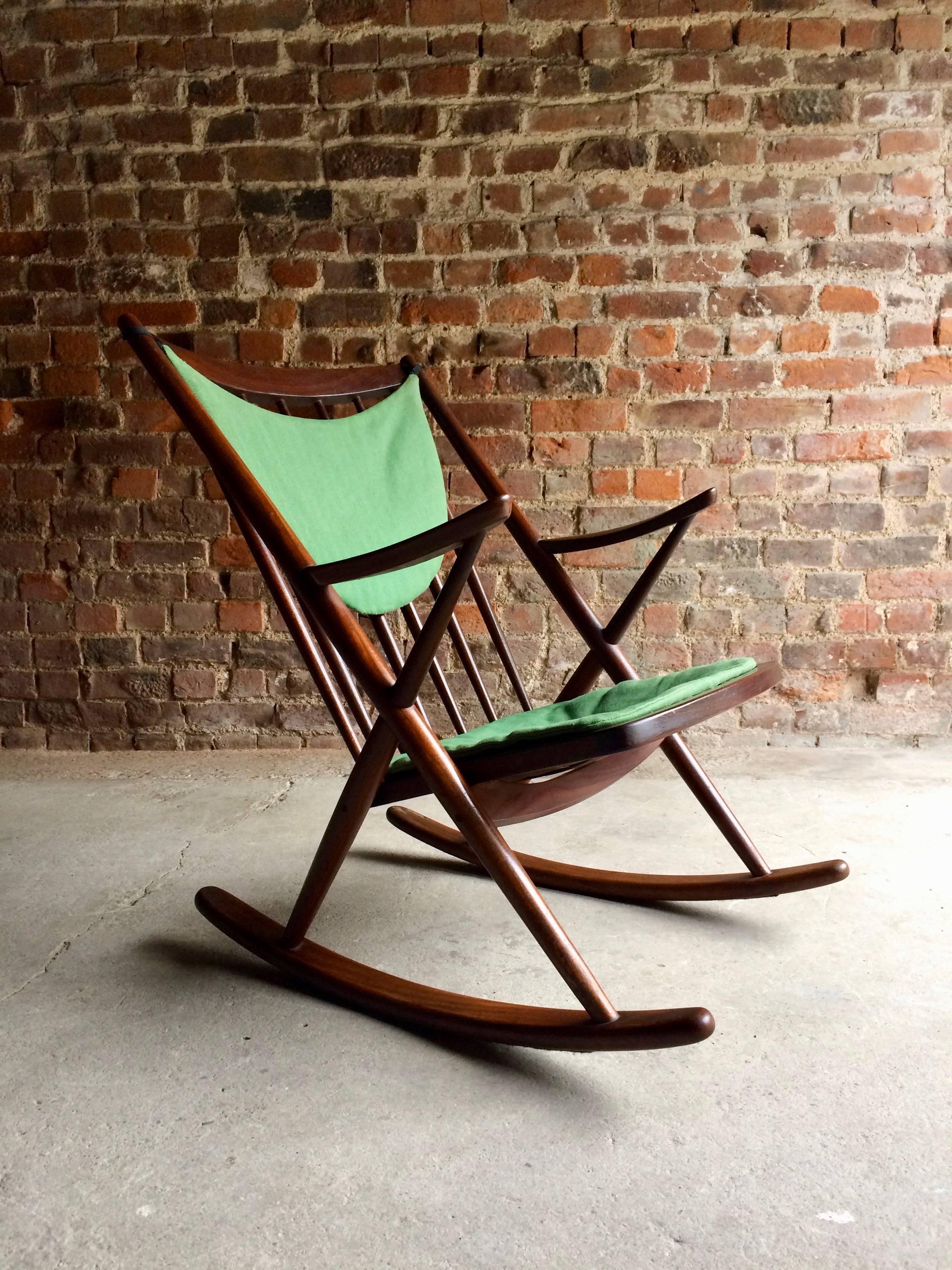 Frank Reenskaug Model 182 walnut rocking chair by Bramin Mobler, Denmark, circa 1960s, in original condition with later and original seat covers.

Dimensions:

Height 33