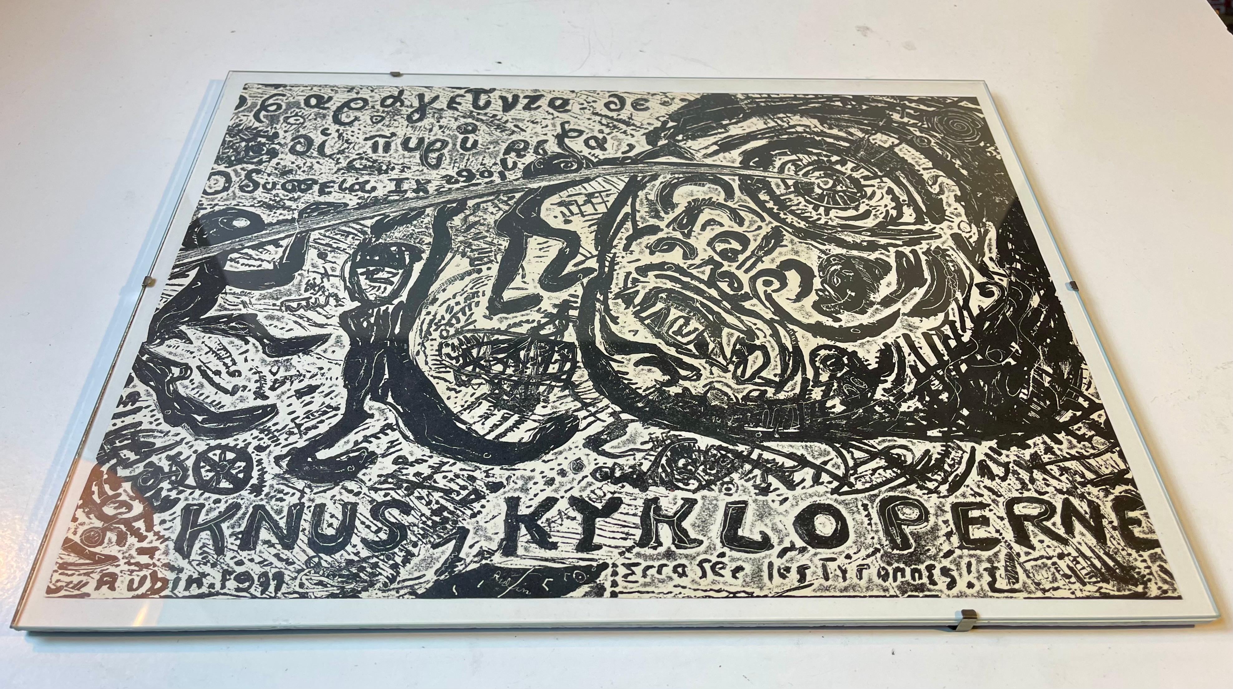 A lot is going on in this brutalistic zincography by the Danish artist Frank Rubin. 'Knus Kykloperne' - 'Destroy the Cyclops' in English depicts 3 beings/humans piercing the cyclops eye with a spier or lance. Symbolic and latin inscriptions are