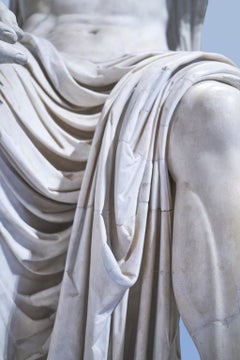 Augusto - photograph of cascading fashion details of antique sculpture