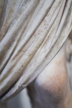 Cesare - photograph of cascading fashion details of antique sculpture