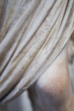 Cesare - photograph of cascading fashion details of antique sculpture