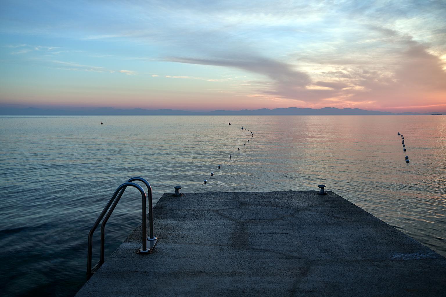 Mediterranean Dip - large format photograph of ethereal sunset and surfaces - Photograph by Frank Schott