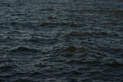 Seascape XII -large format photograph of monochrome blue water surface and Cloud