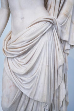 Venus - photograph of cascading fashion details of antique sculpture
