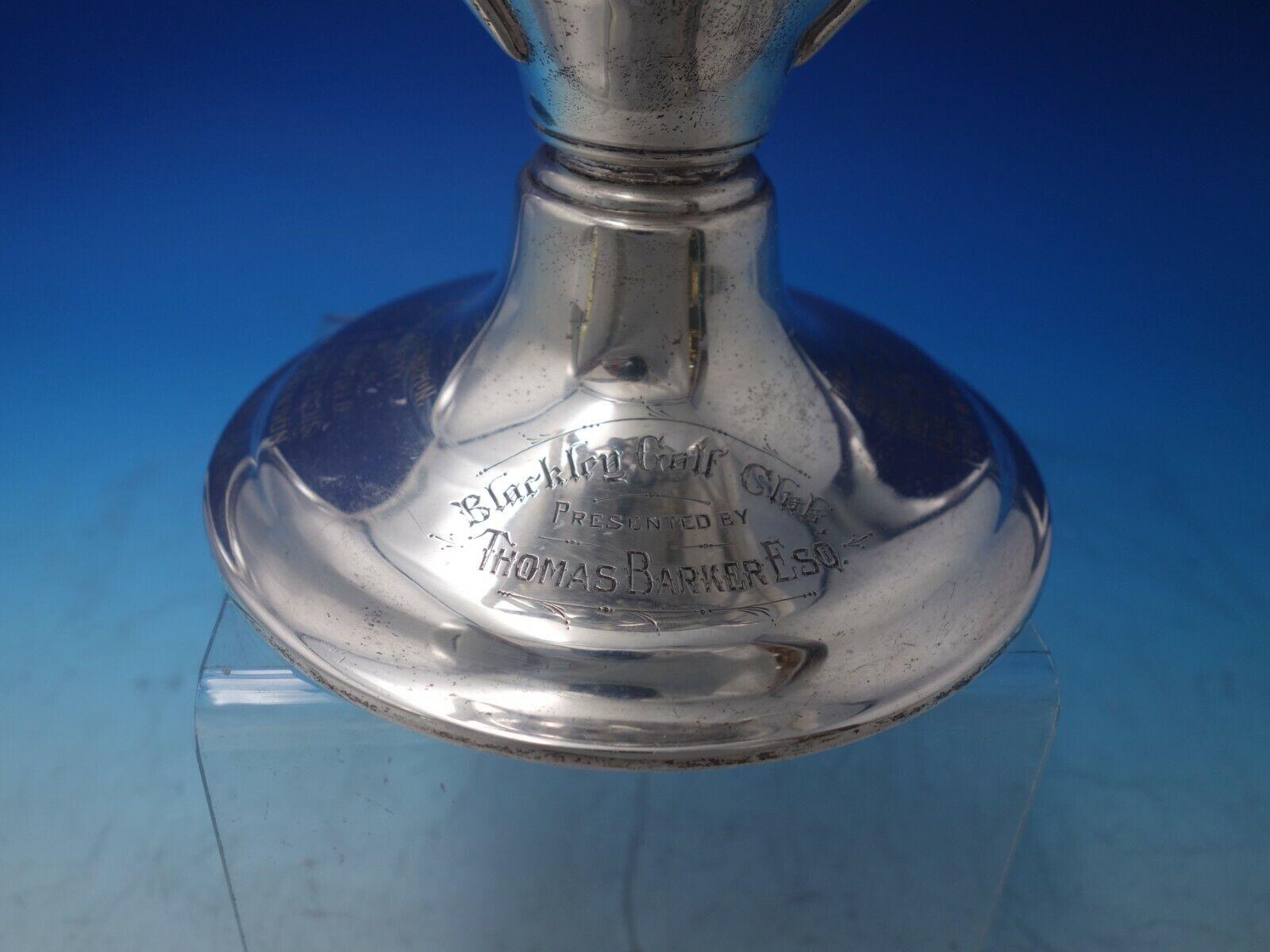 Frank Smith

Incredible Frank Smith sterling silver trophy / loving cup with 3 handles, for Barkley Golf Club starting in 1909 - 1937. Piece features a pair of 3D golf clubs and ball. The piece measures 14