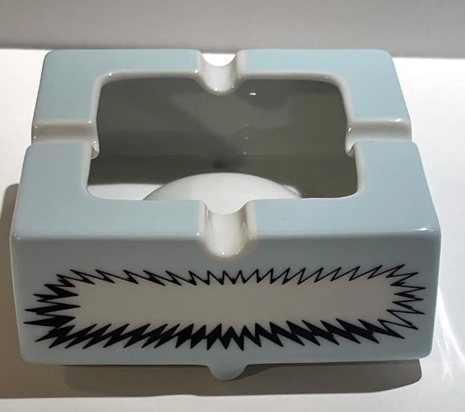 Frank Stella
Porcelain Ashtray in hand designed bespoke box, 2000
Porcelain dish in original box
Limited Edition of 2000 
Signed in plate, Artists incised signature on box.
4 1/2 × 3 1/2 × 3 1/2 inches
Produced by Rosenthal, Inc. for Philip Morris