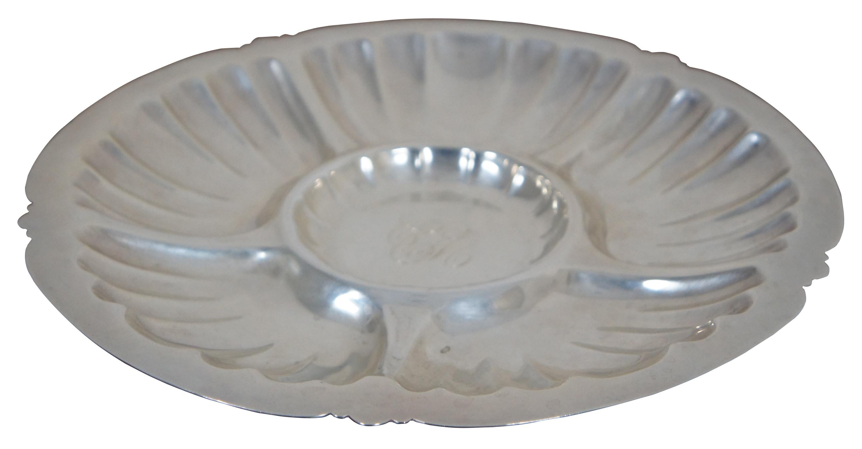 Vintage Frank M. Whiting number C607 six sectioned / divided shrimp, appetiser, cocktail serving plate or tray with round scallop form and shell design, engraved in the center with the initials CMC. “North Attleboro, MA - Origin as Holbrook Whiting