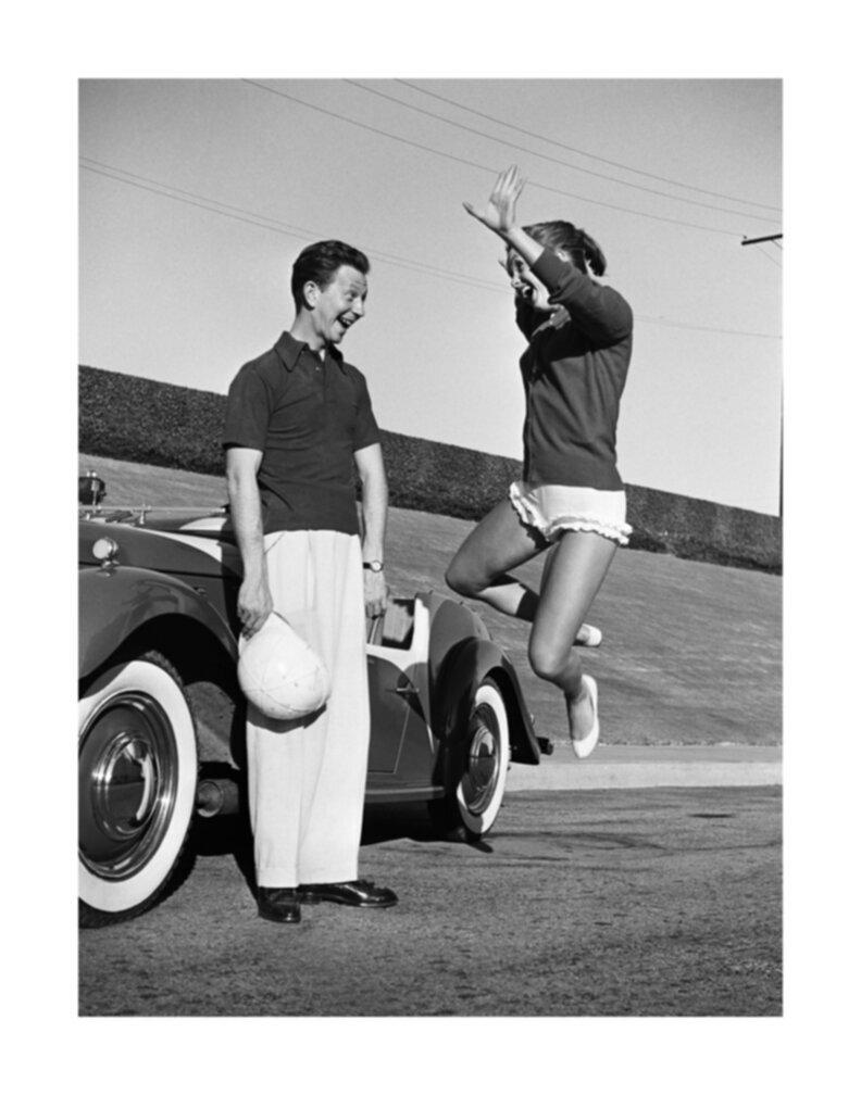 Frank Worth Black and White Photograph - Donald O'Connor and Debbie Reynolds Mid-Jump