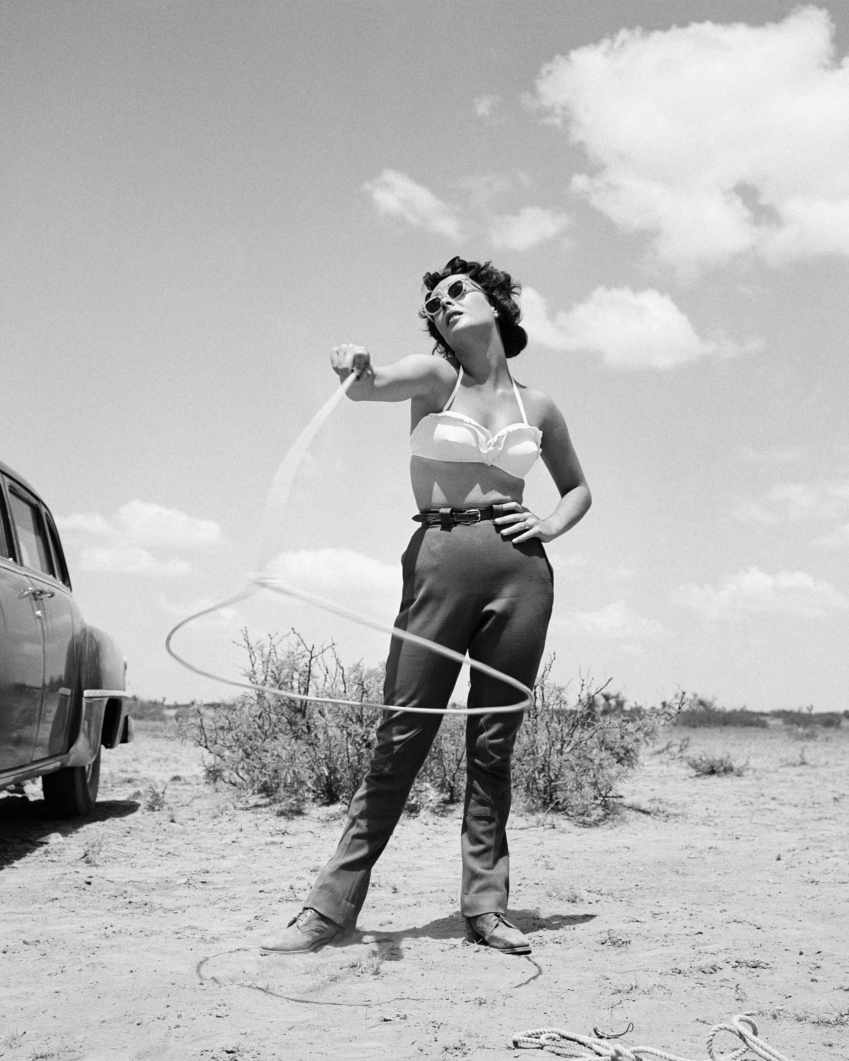 Frank Worth Black and White Photograph - Elizabeth Taylor Spinning Lasso in Giant 20" x 24" Edition of 75