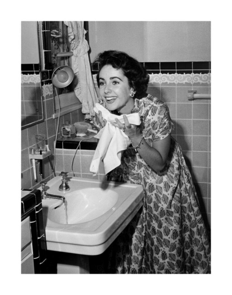 Frank Worth Black and White Photograph - Elizabeth Taylor Washing Face