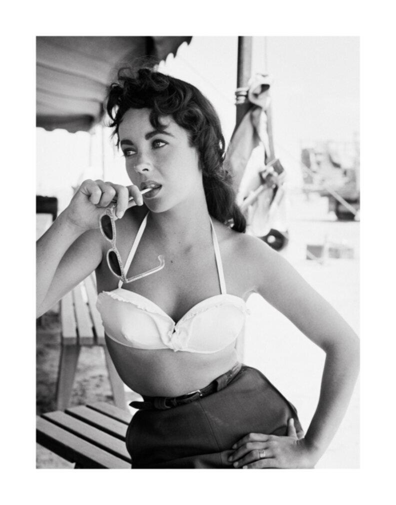 Frank Worth Black and White Photograph - Elizabeth Taylor with Sunglasses for "Giant"