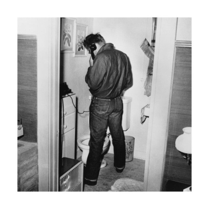 Frank Worth Black and White Photograph - James Dean in Restroom