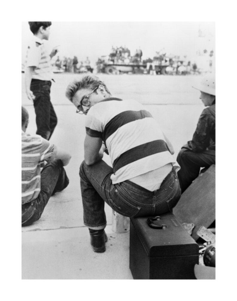 Frank Worth Black and White Photograph - James Dean Sitting at Car Rally