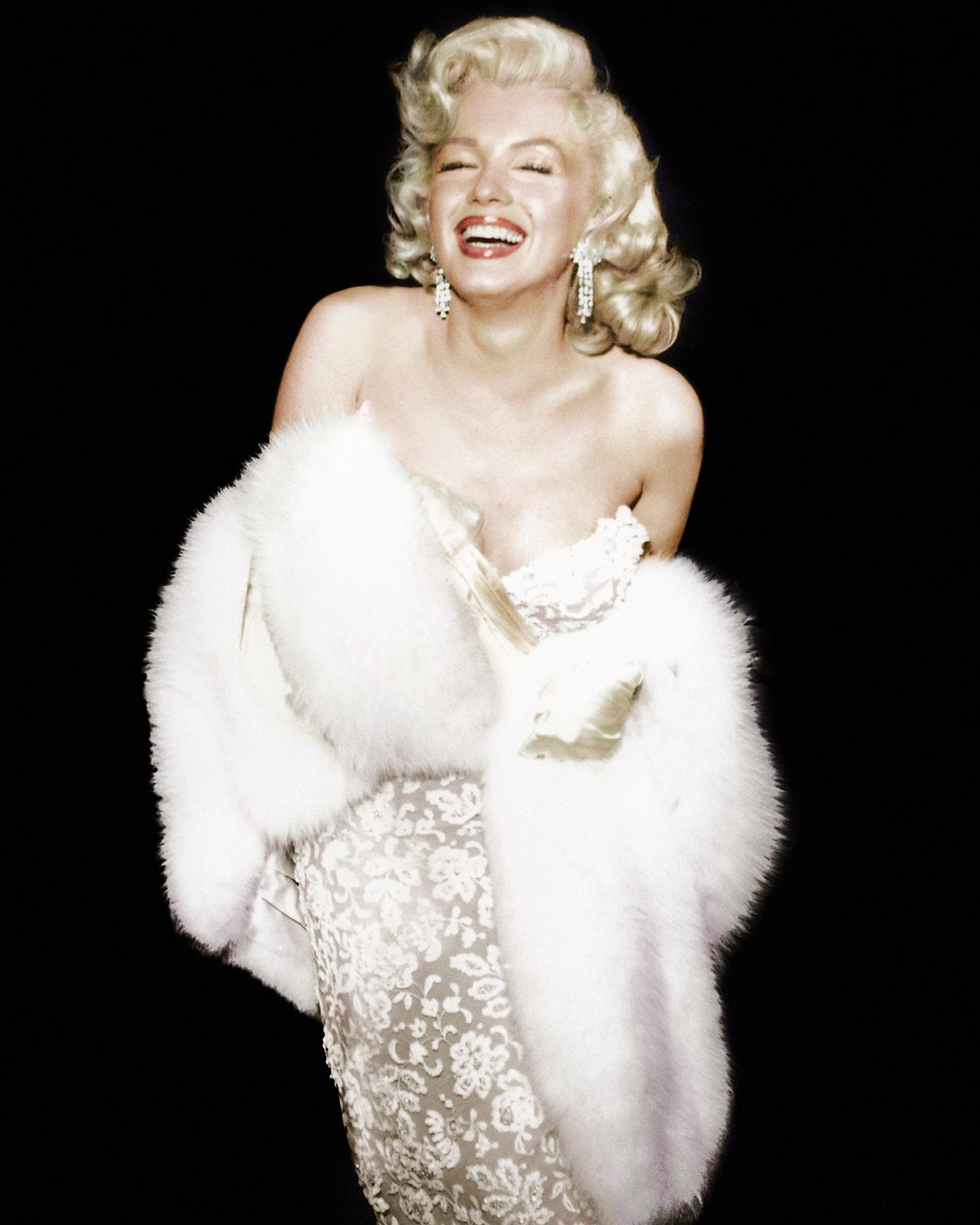 Frank Worth Color Photograph - Marilyn Monroe Smiling in Fur