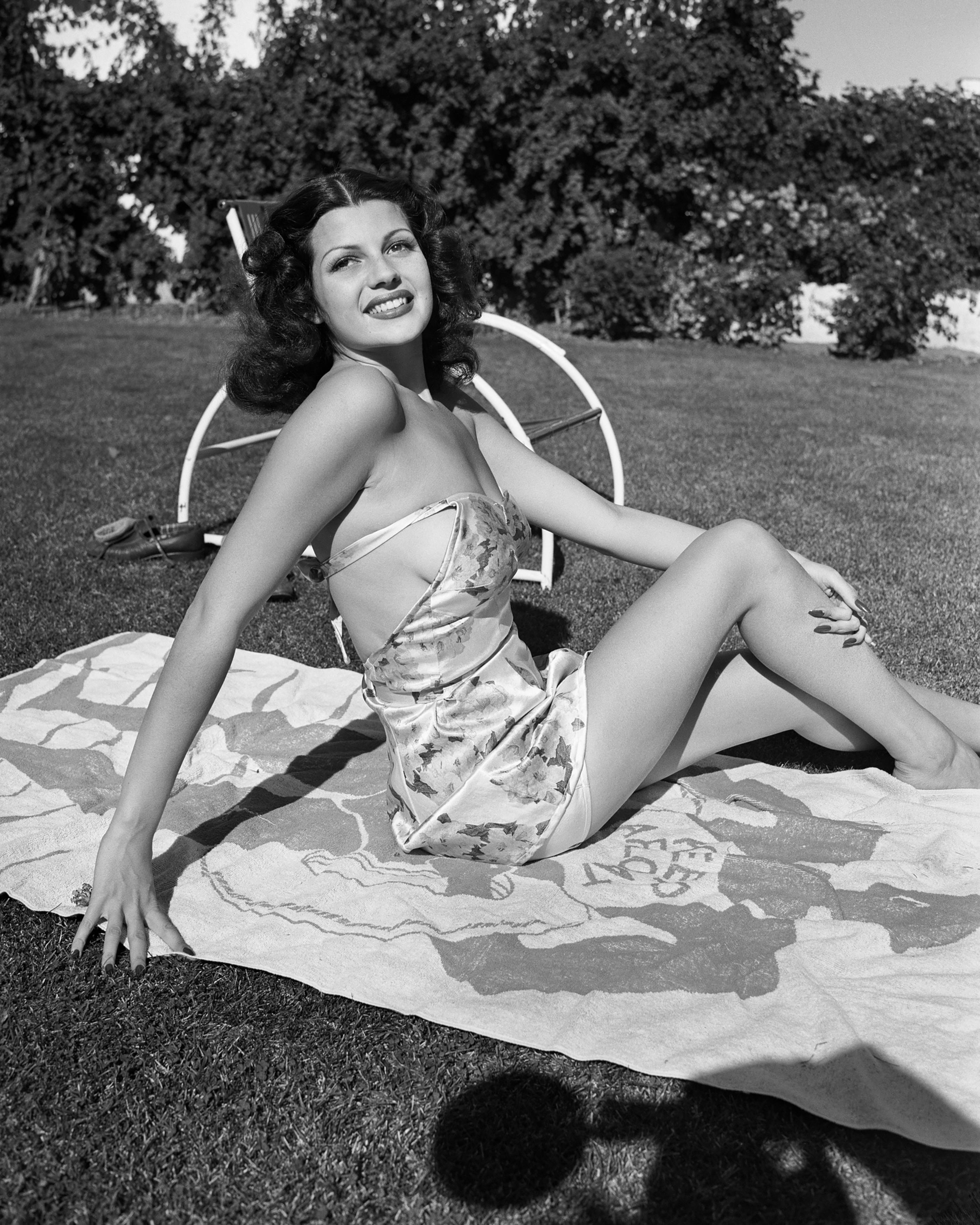 Frank Worth Black and White Photograph - Rita Hayworth Sunbathing 16" x 20" Edition of 125