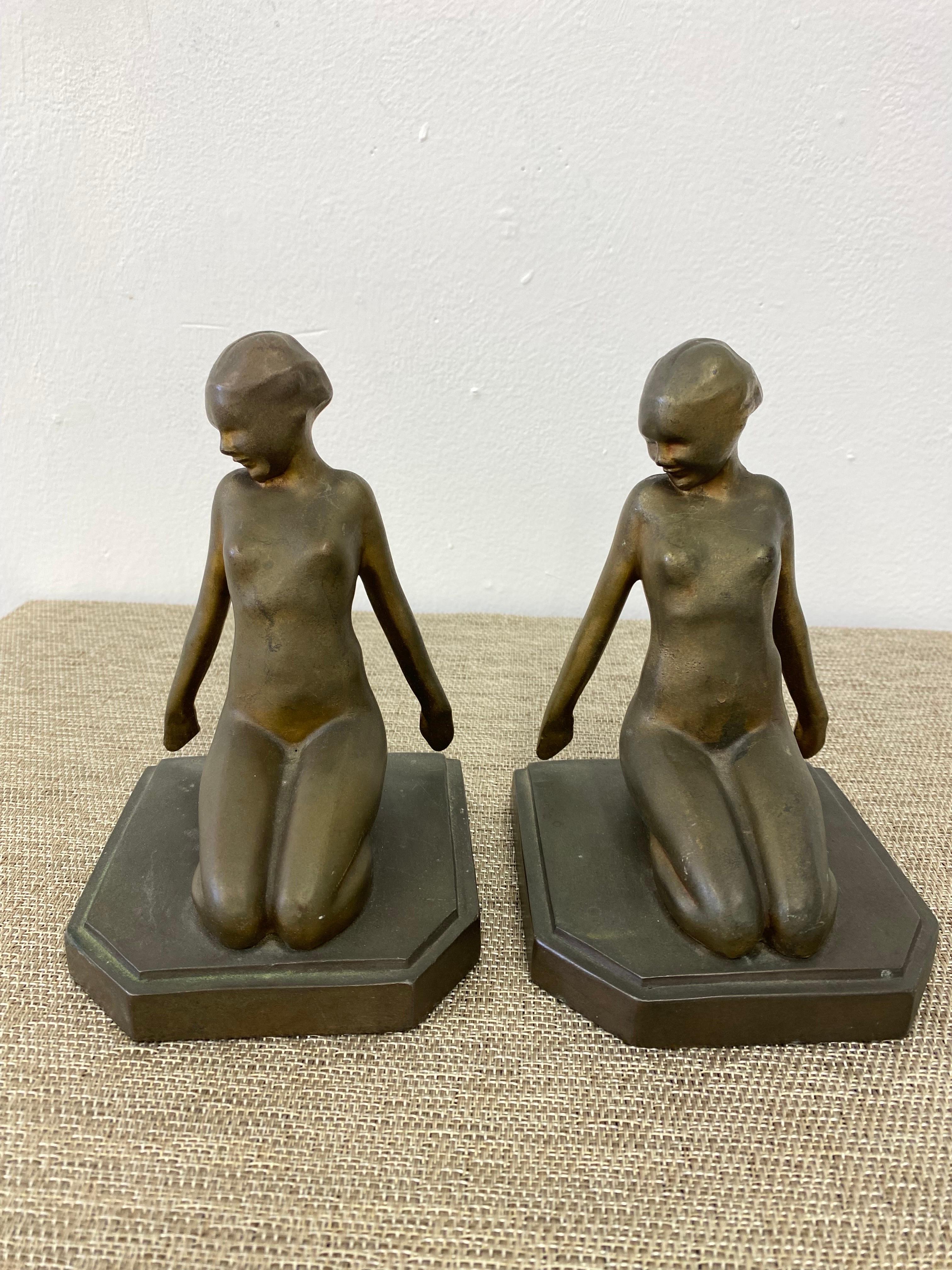 Frankart Kneeling Ladies Bookends Model B412 in nice original condition.  Nice Patina, worn finish.  One lady has a crack to backside of head as seen in photo.