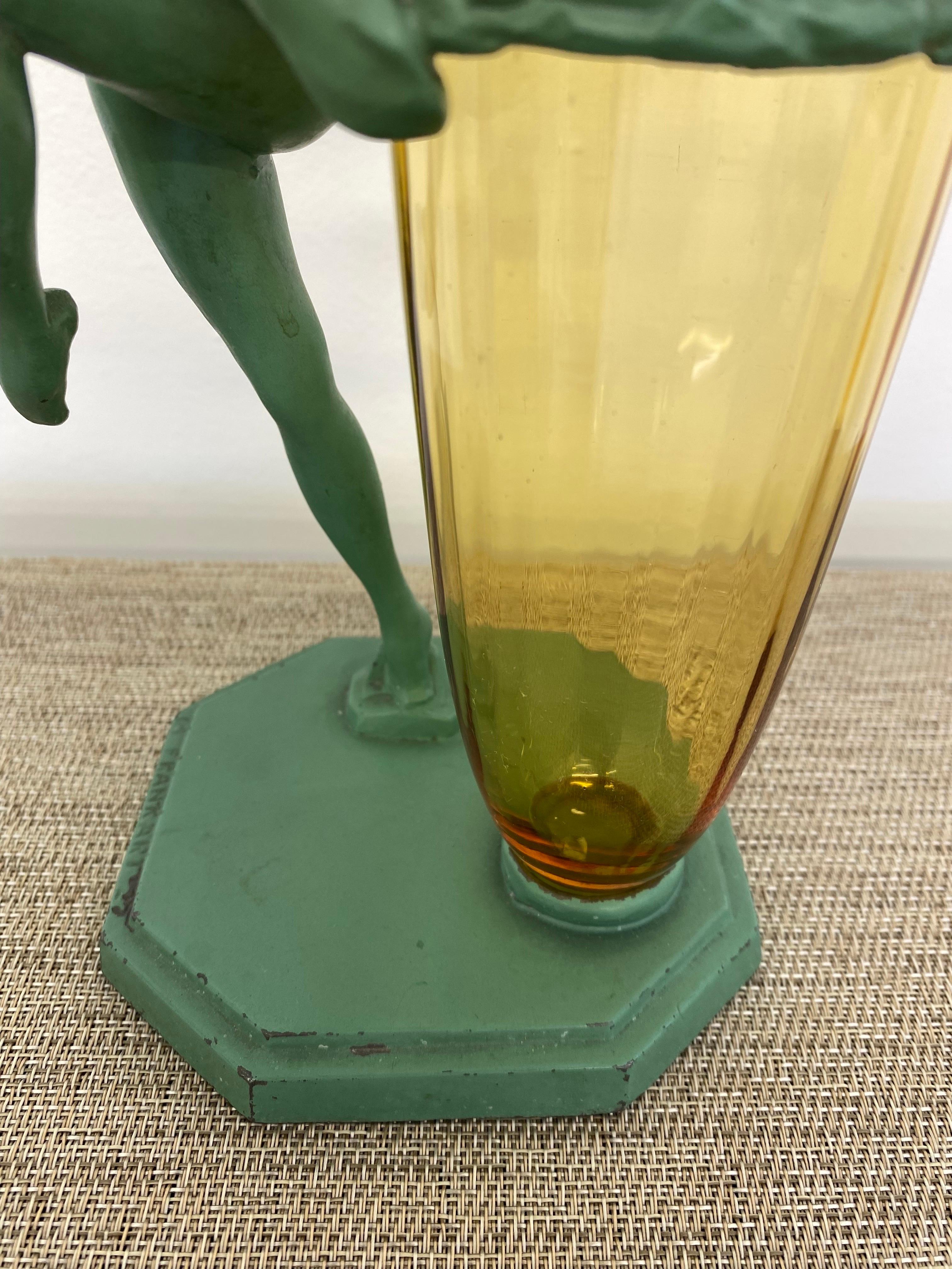 Frankart Lady Holding Steuben Glass Vase, model F612.  Metal shows great patina with a little paint loss.  Classic Frankart Design by Arthur von Frankenberg.