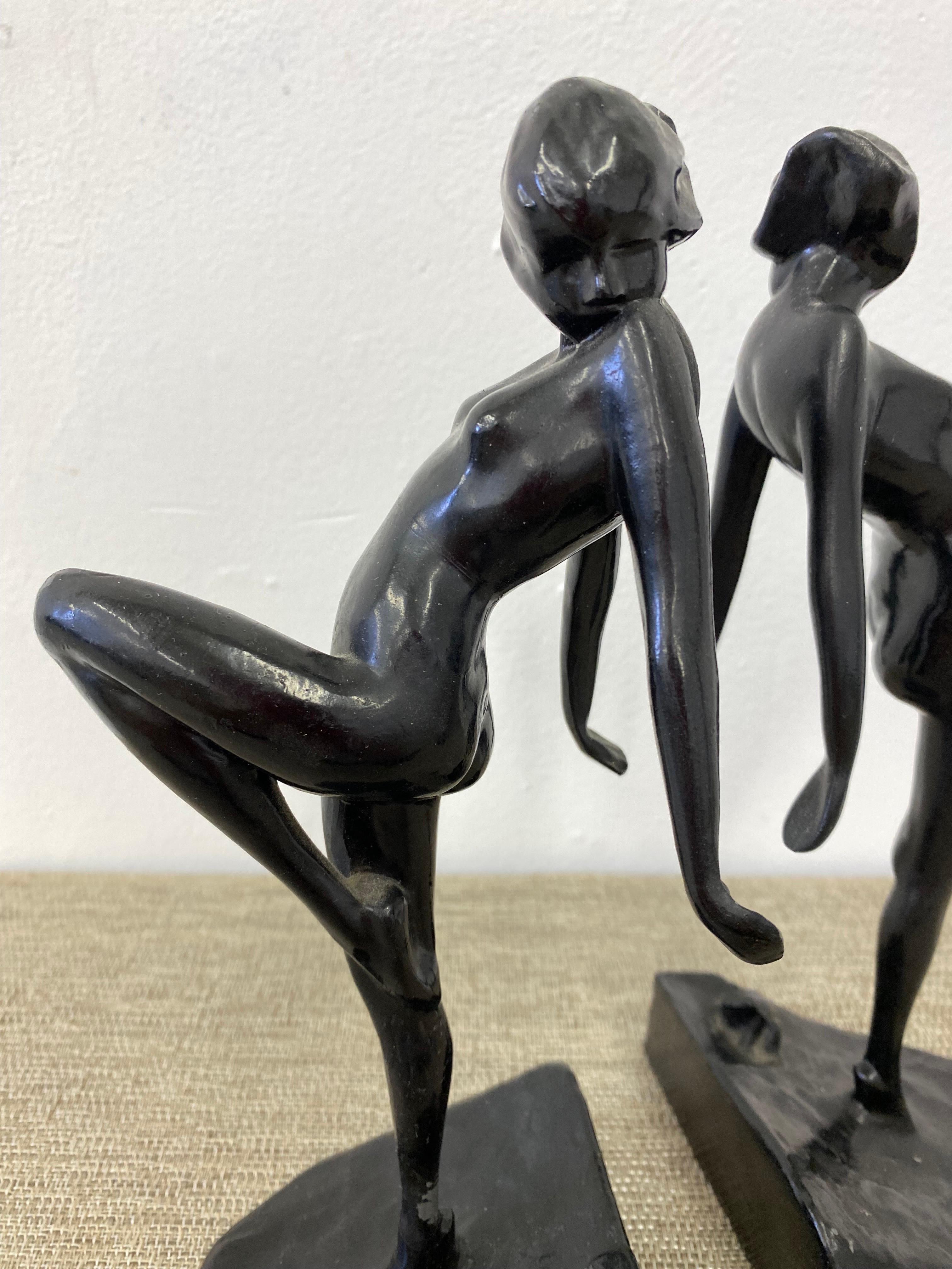 Frankart standing Nude lady frog bookends N0 B401 with their original black paint finish. Overall in nice condition with a few areas of paint loss. Classic Pose and look! One of Franenberg's most classic designs!