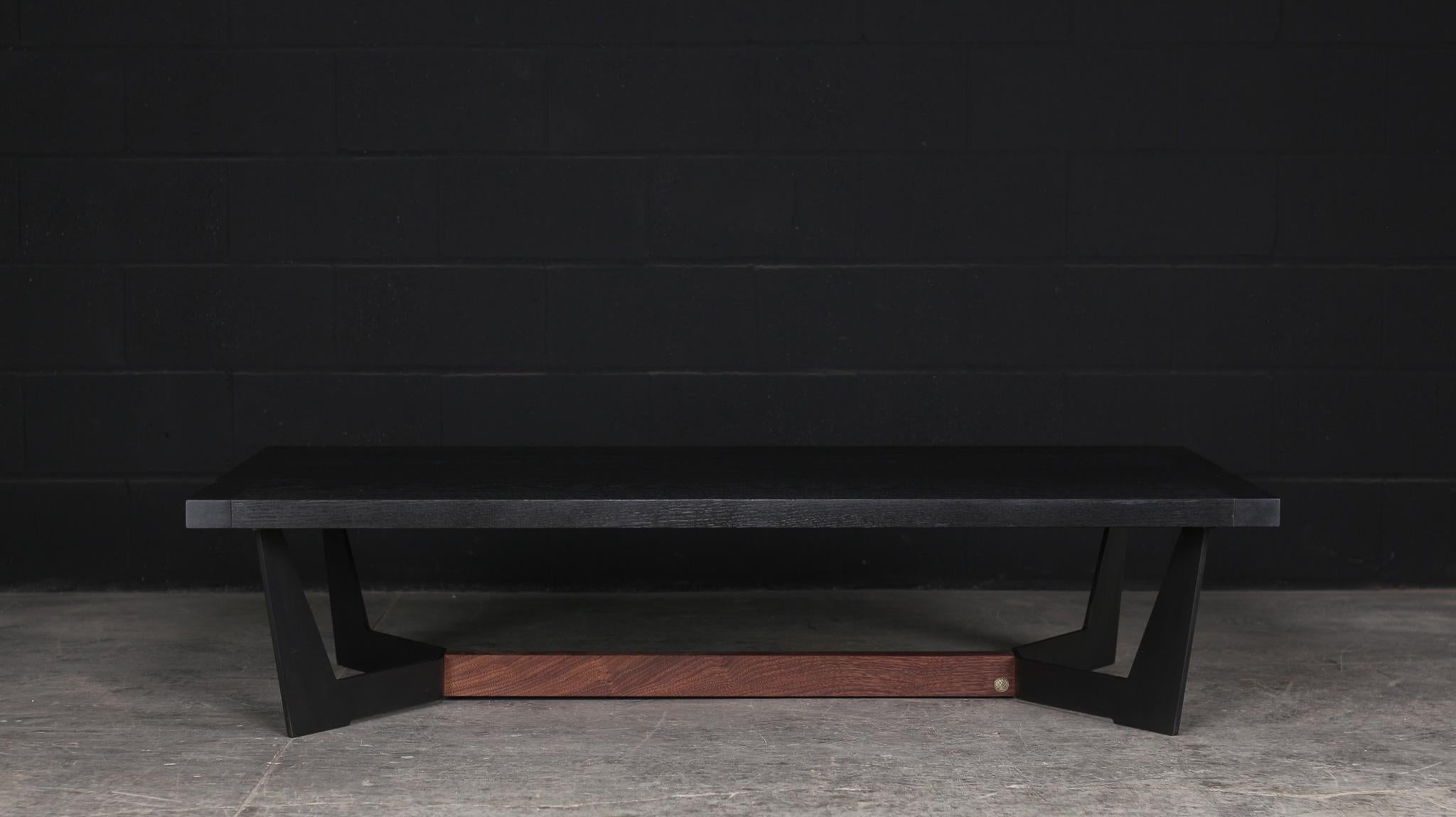 The Franklin centre table is handmade from a thick solid wood surface and featured subtitle hand polished brass details at the end. It has a hand rubbed natural oil and wax finish that enhance the real beauty of the wood and give a natural warm
