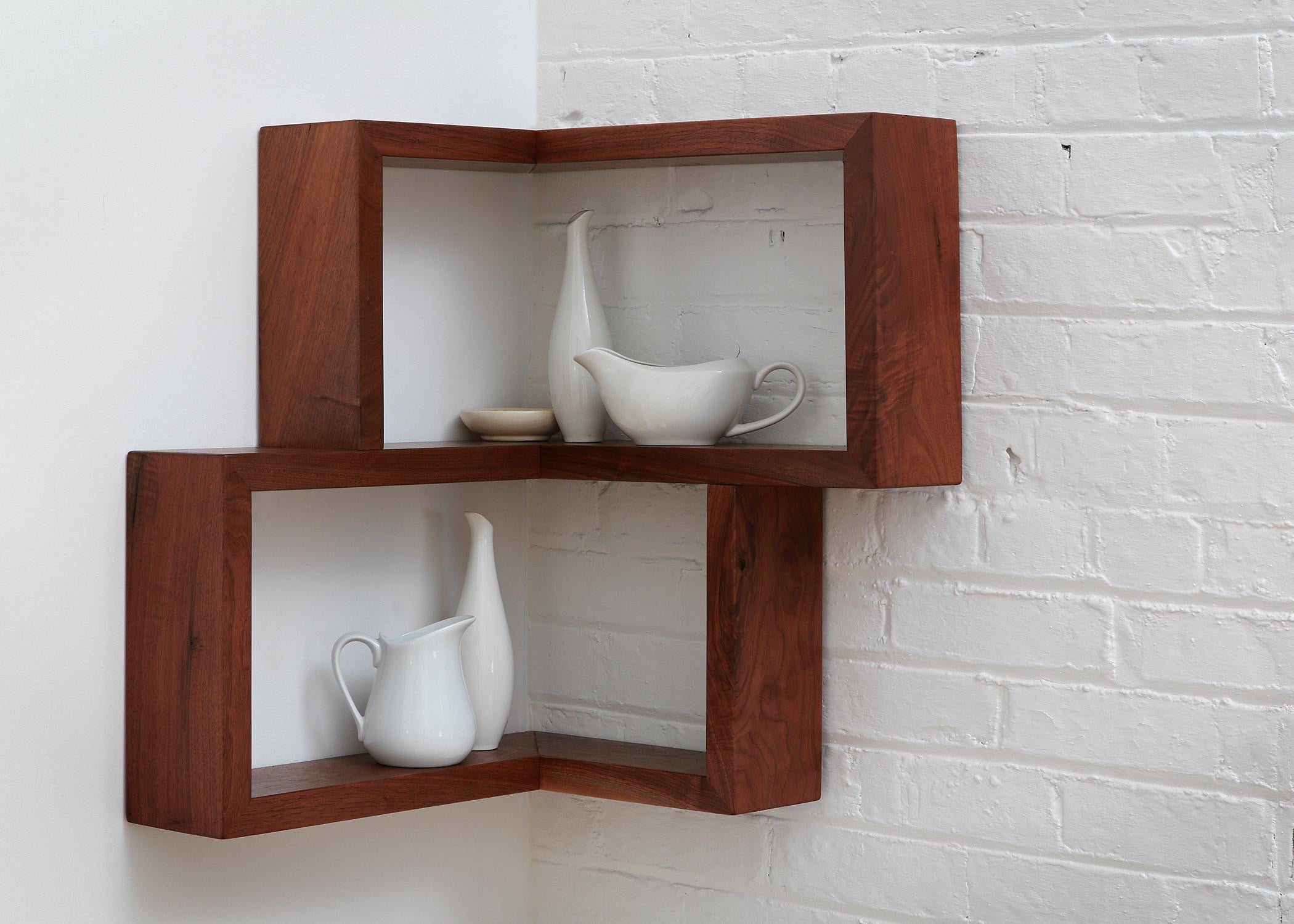 The award nominated Franklin Shelf is a 90 degree corner shelf. This unique design allows for maximum storage space, while occupying a very small area. The smooth wooden finish of this shelf will make a great addition to any corner, table, or