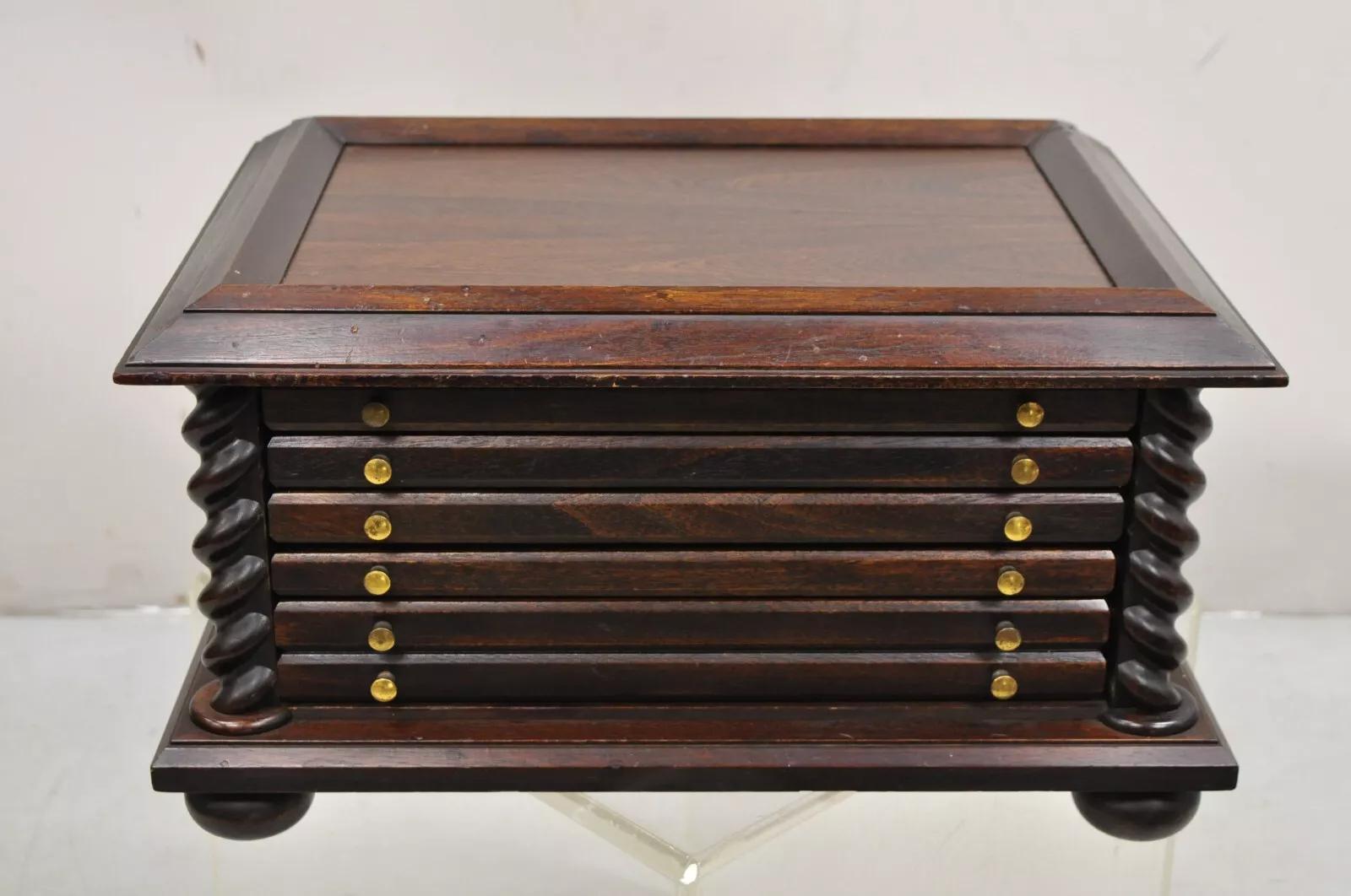 Franklin Mint  Belgian Mint House Barley Twist Five Drawer  Mahogany Coin Chest. Item Features Bun feet, five drawers with four drawers having felt lined interior which holds 25 coins each and one double drawer below. Circa Late 20th Century.