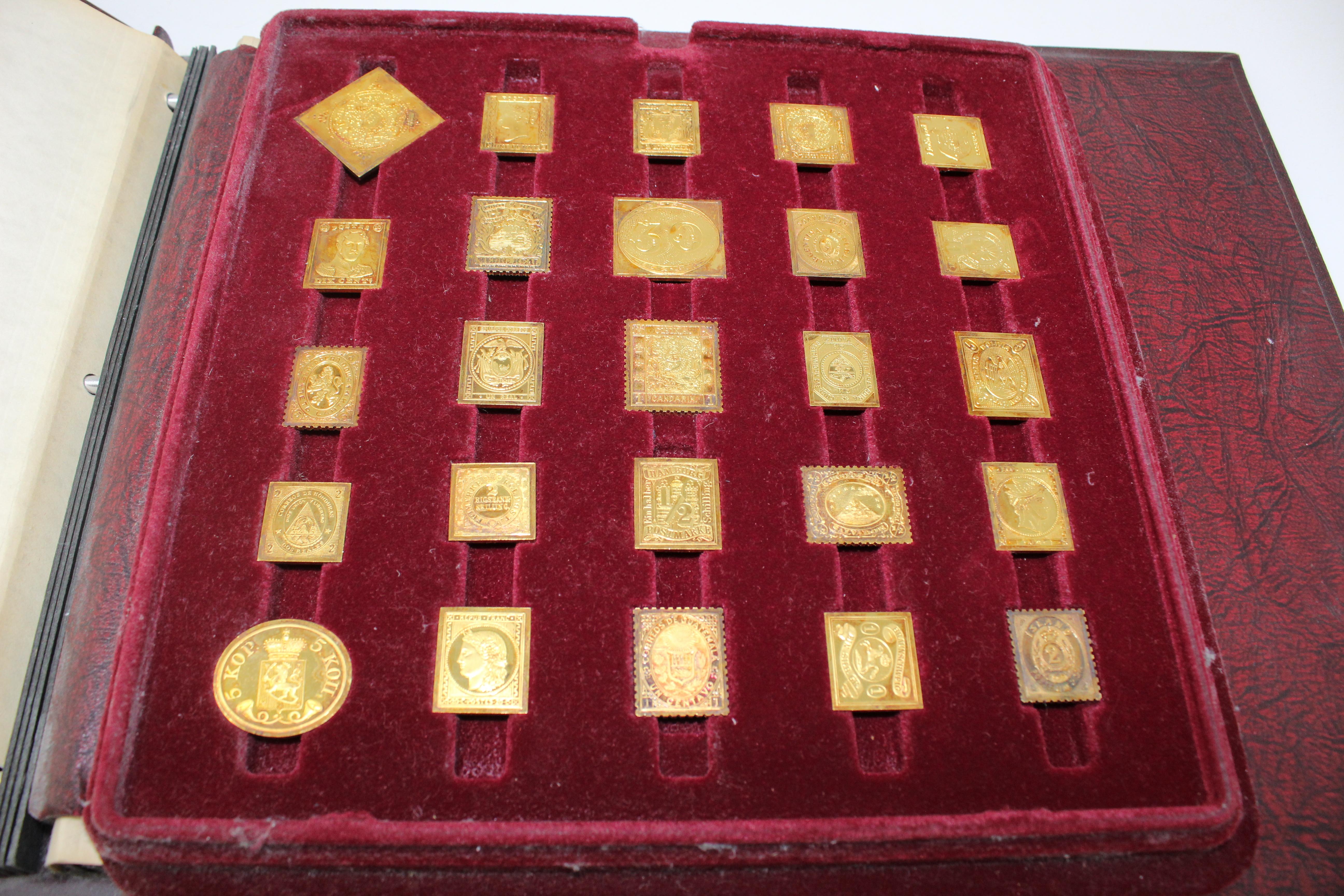 From The Franklin Mint back in 1979

Franklin Mint World's First Stamps - 24-karat gold on silver proofs
International Society of Postmasters 
25 stamps.

Measures: Binder - 29.2cm x 33cm.