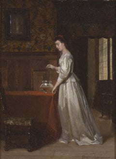 Frau füttert Goldfische in einem niederländischen Interieur, um 1870