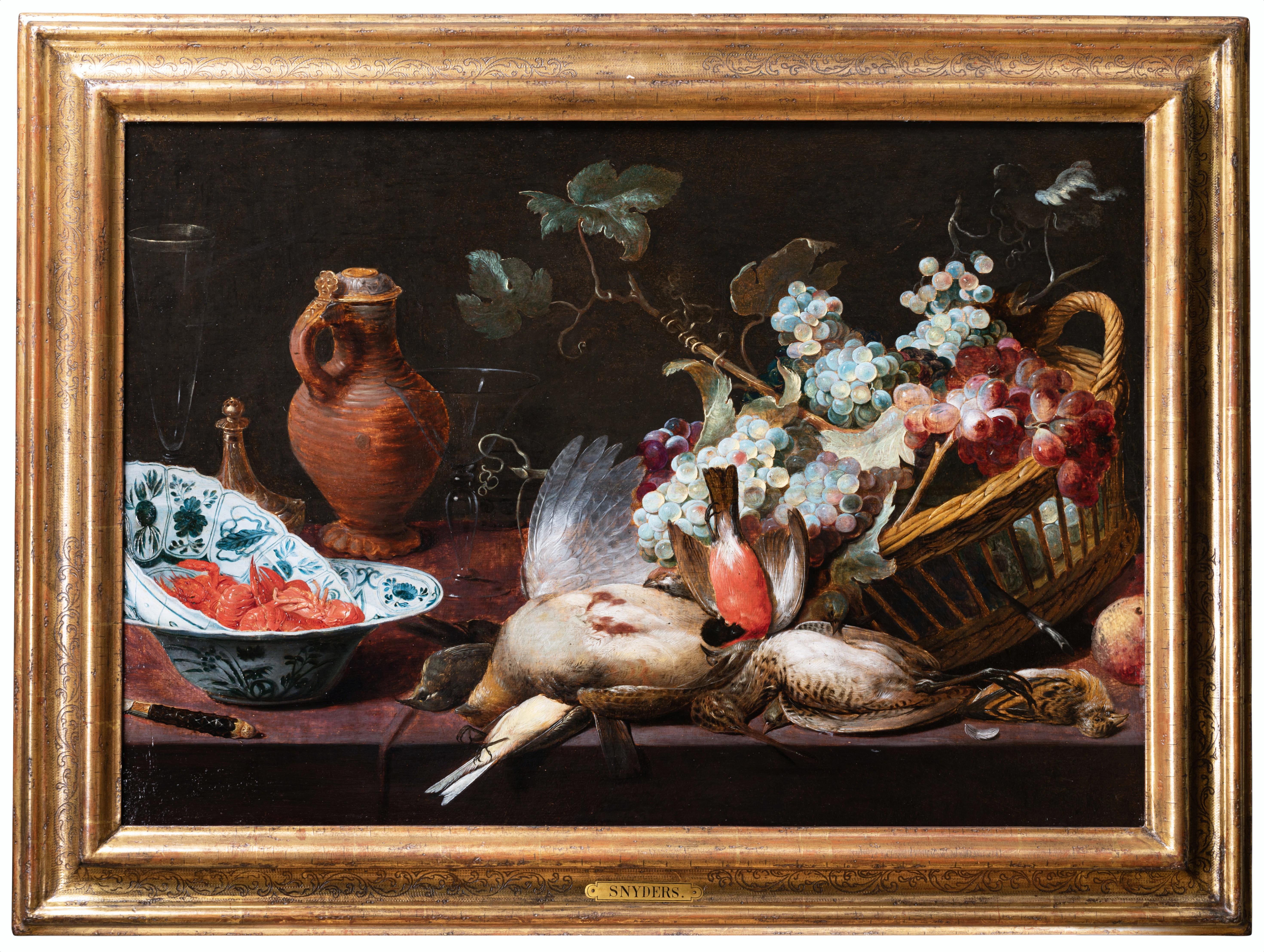 STILLLEBEN MIT VÖGELN UND ROSINEN, WERKSTATT VON FRANS SNYDERS (1579-1657)
Unser exquisites und attraktives Gemälde mit seiner reichen und harmonischen Komposition ist eines der bemerkenswertesten Beispiele für die Leidenschaft der Kunstliebhaber