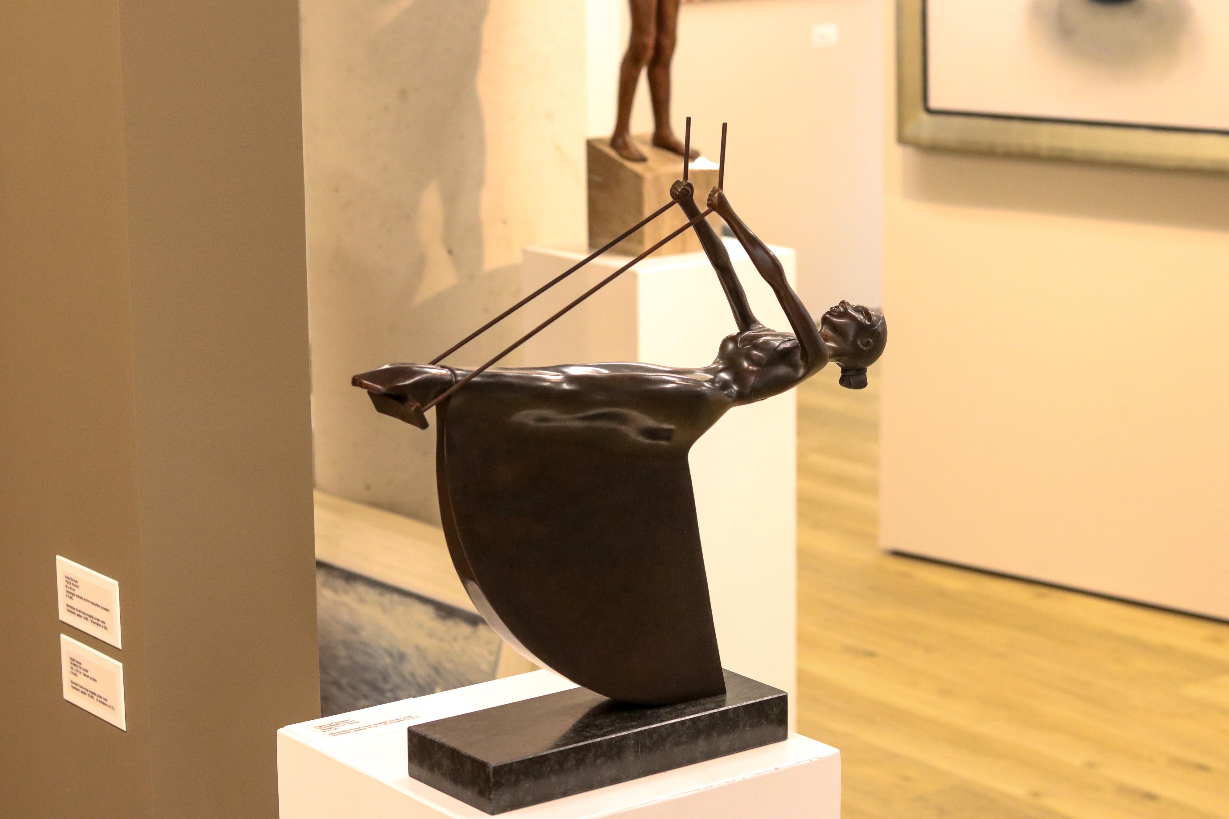 Swinging III - 21st Century Contemporary Bronze Sculpture of a Woman On A Swing - Gold Figurative Sculpture by Frans van Straaten