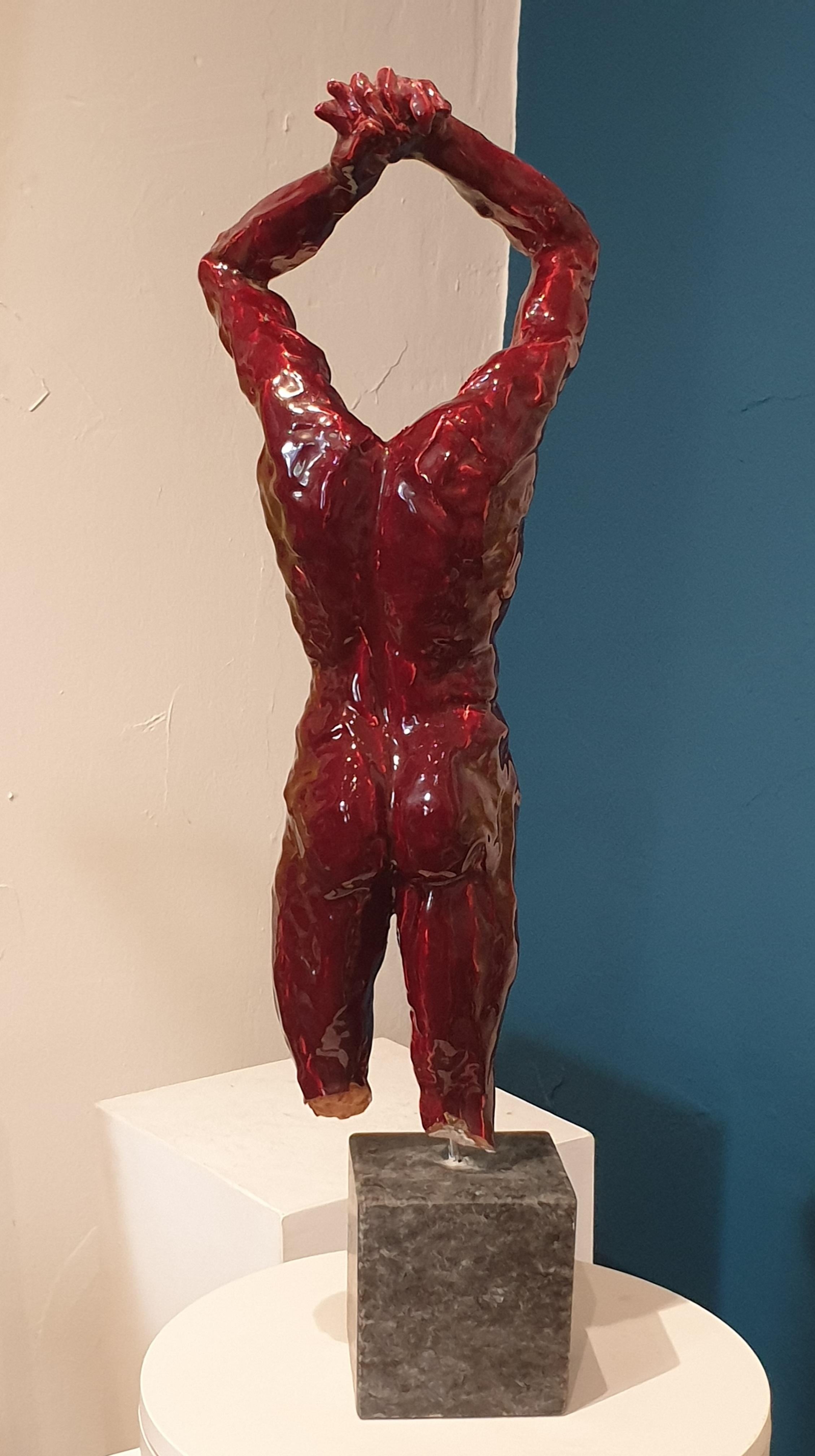 French Mid 20th Century ceramic figure of a man in Sang de Boeuf, oxblood red, glaze presented on a metal 'tige' and marble base.

The sculpture is not signed but was purchased from Nice, France, in the 1970s as a work by 'Franta'. it is however