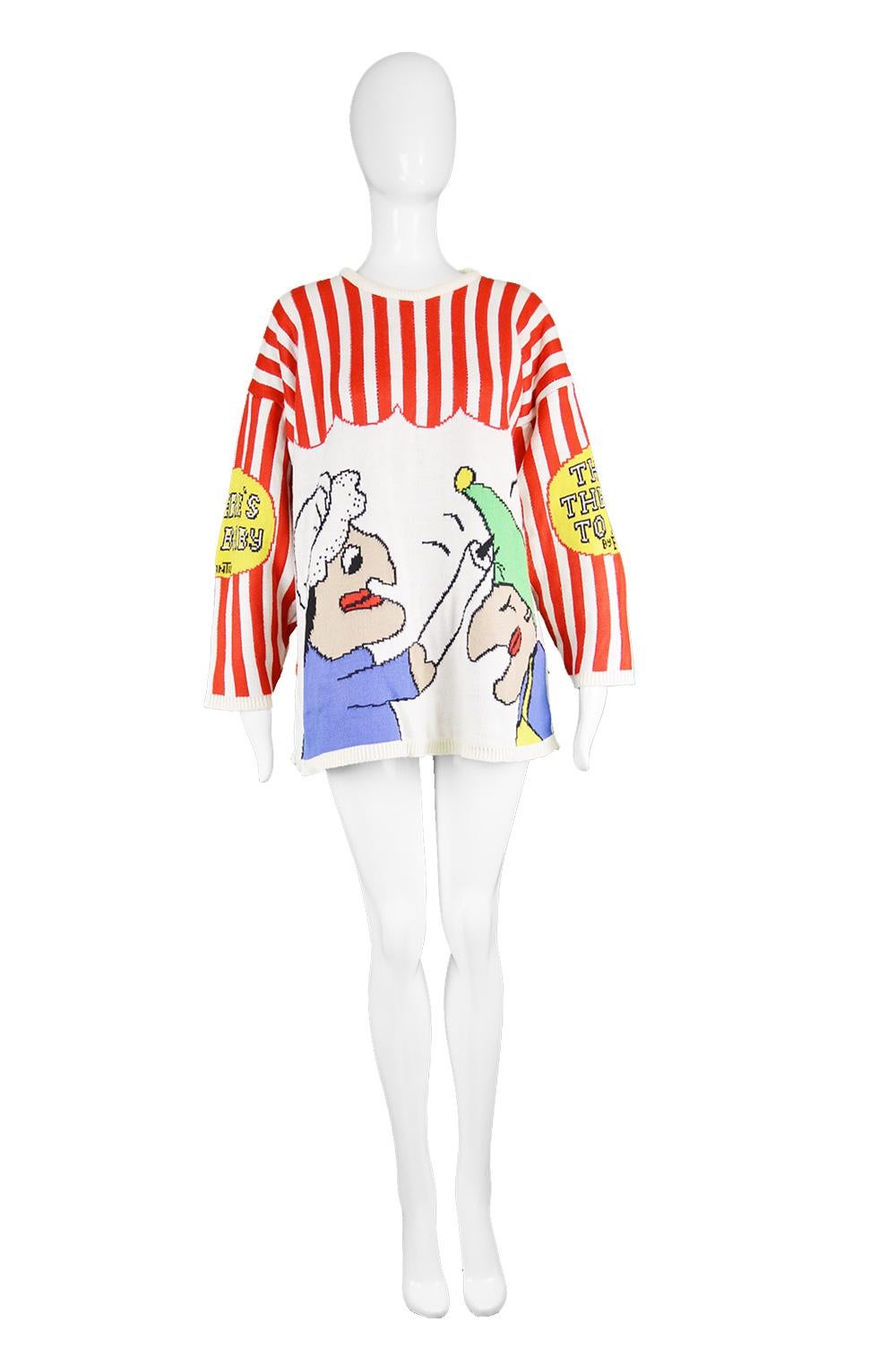 An ultra cool vintage women's oversized crew neck sweater from the 90s by British boutique label, Frantic. In a cream acrylic knit fabric with red stripes and a bold, tongue in cheek pop art take on the Punch & Judy puppet shows. It has the words