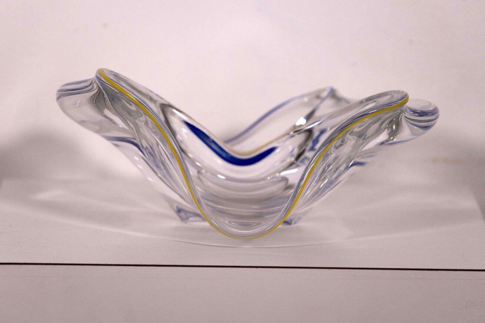 The Frantisek Zemek blue and yellow abstract glass sculpture with dual bowls is a captivating masterpiece that harmoniously blends form and function. Etched signature on bottom. Handcrafted with precision, the dish showcases Frantisek Zemek's