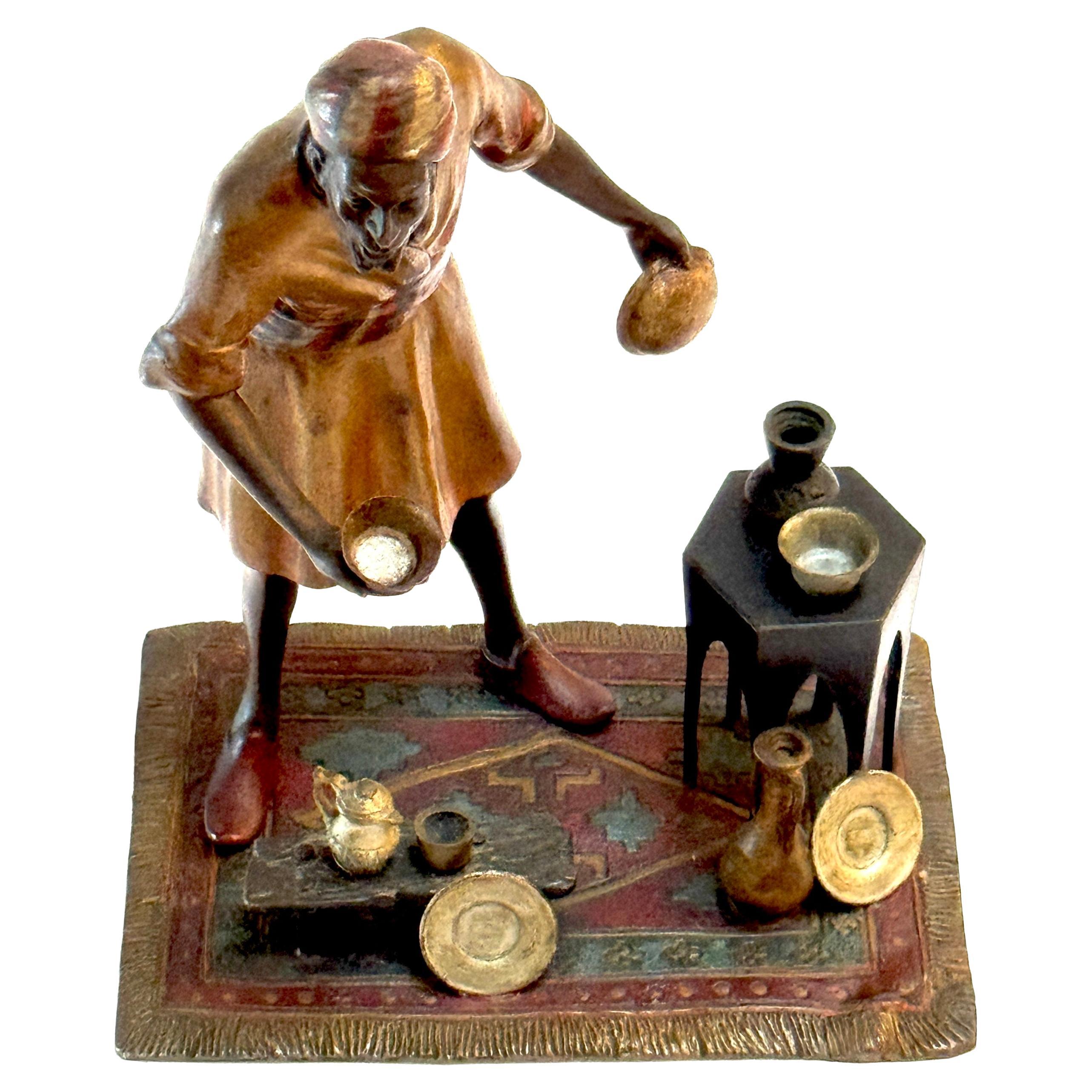 Franz Bergman Austrian Cold Painted Bronze Merchant 

This Franz Bergman Austrian cold-painted bronze sculpture is a stunning example of early 20th-century Viennese craftsmanship, known for its intricate detail, vibrant colors, and storytelling