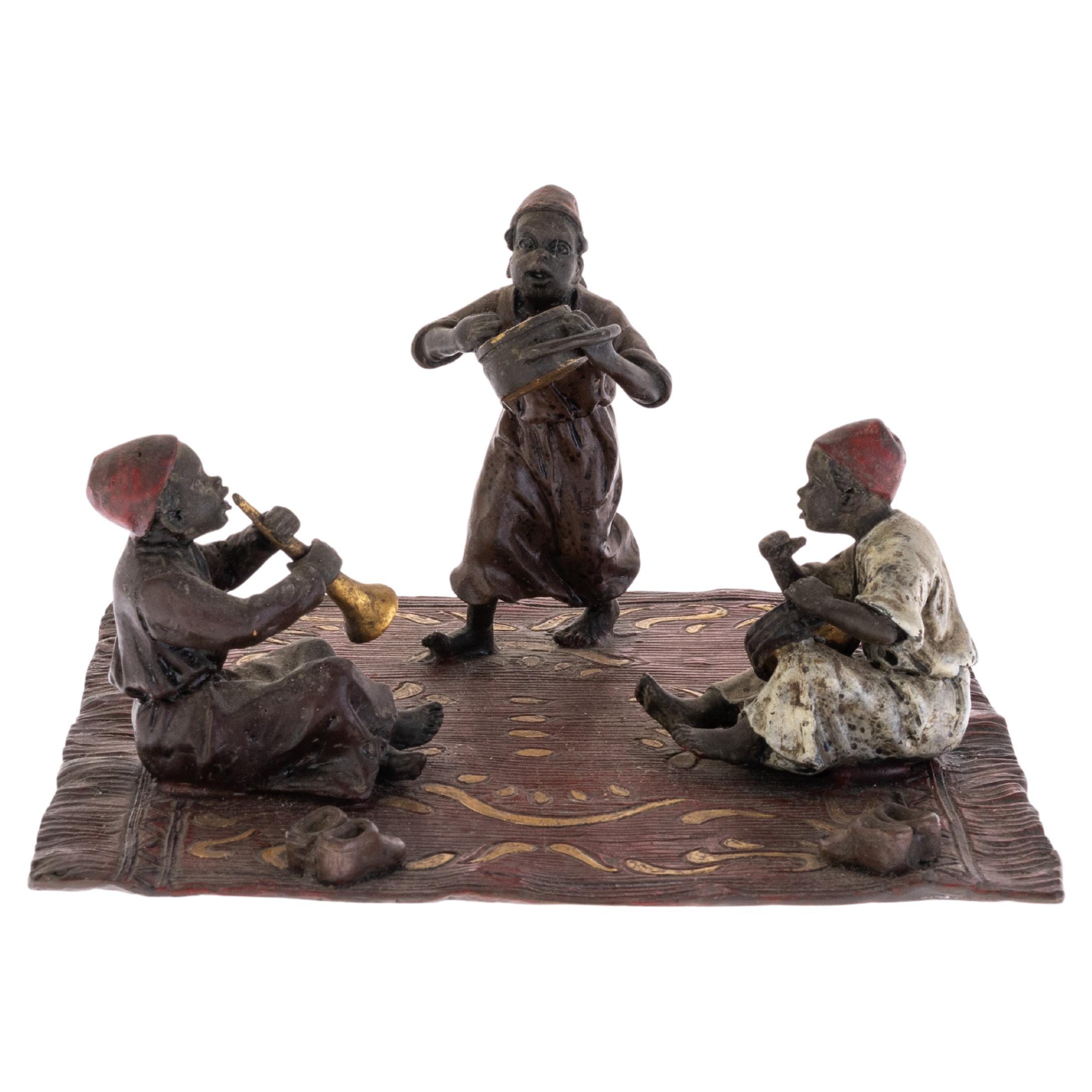 Franz Bergman Escultura vienesa orientalista de bronce pintada en frío Músicos árabes