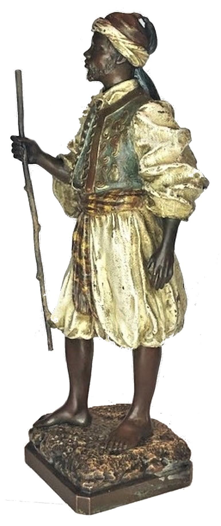 Artist: Franz Xaver Bergmann

Sculpture: Moorish Traveler with Staff

This wonderful life-like sculpture depicts a Moorish traveler in a historical costume, with a staff in his hand. It is created in polychrome cold-painted bronze, and rendered