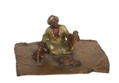 Arab Man with Three Monkeys, Orientalist Bronze Sculpture by Franz Bergmann