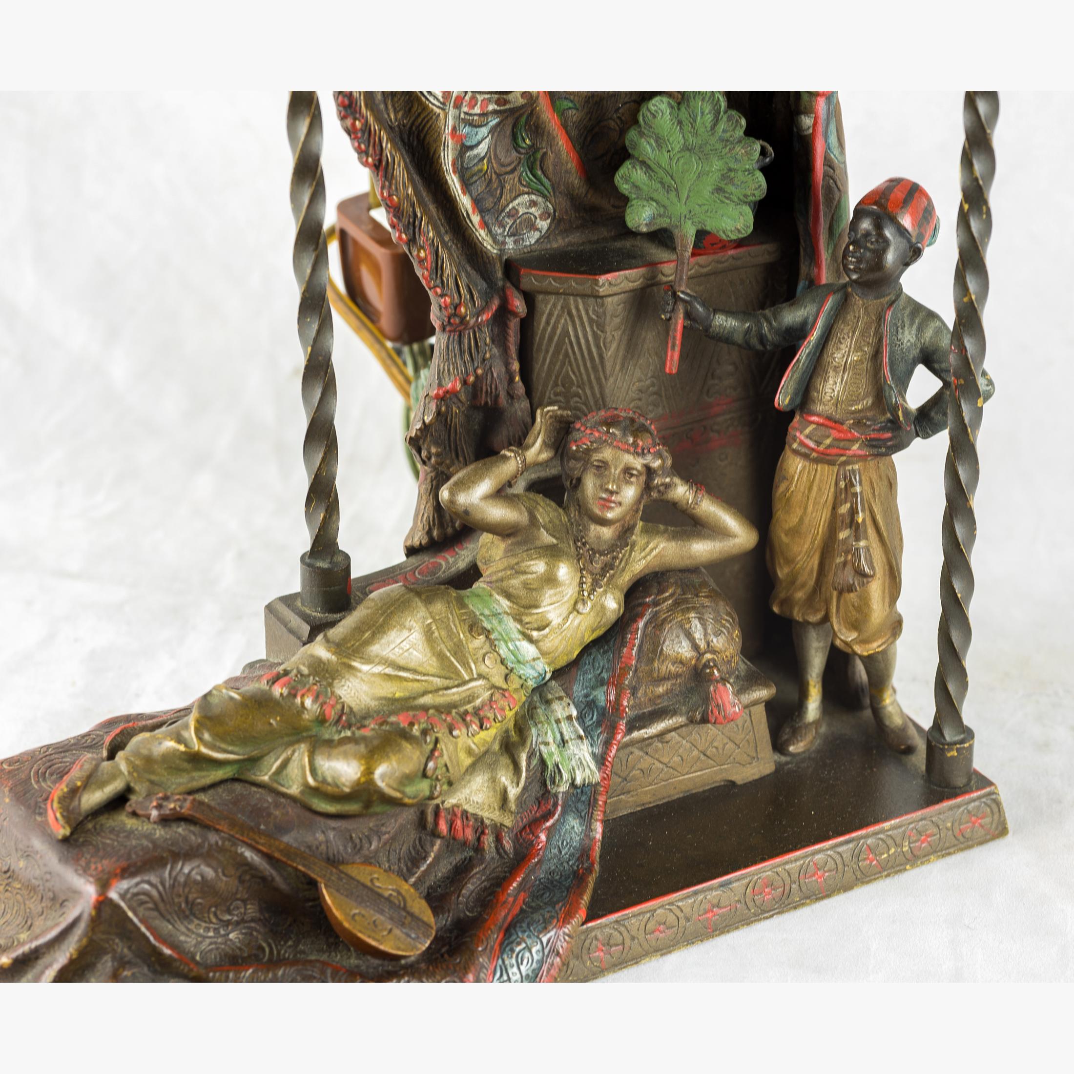 FRANZ BERGMANN
Austrian, (1861-1936)

A Lounging Concubine       

depicting a reclining woman being fanned by her servant. Inscribed ‘Nam Greb’ with foundry mark.
17 inches high
