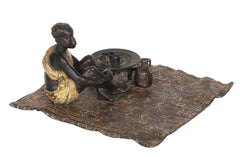 Boy on Persian Rug, Stamp Signed Orientalist Bronze Sculpture by Franz Bergman
