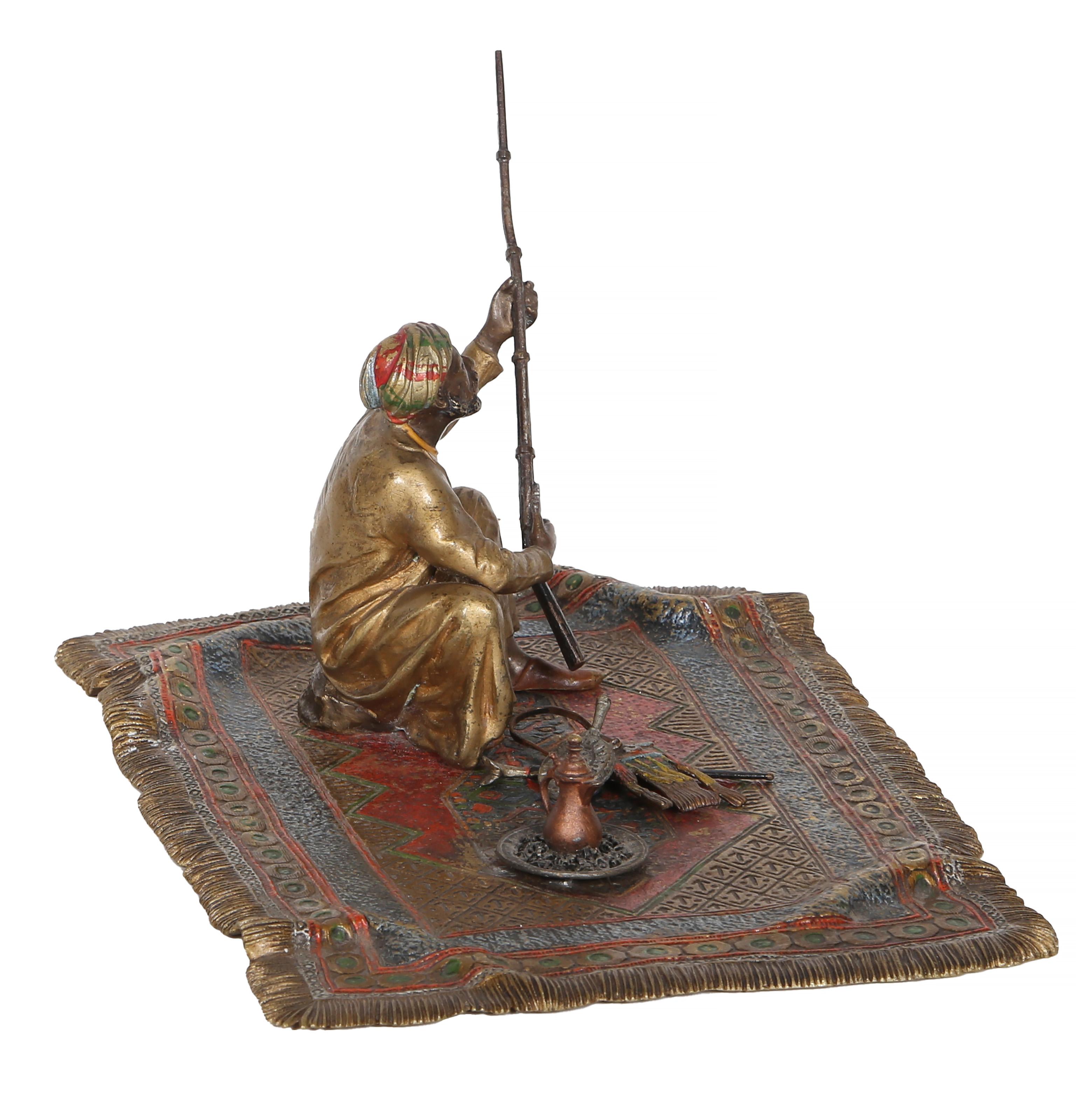 Man on Persian Rug, Orientalist Bronze Sculpture by Franz Bergmann For Sale 4