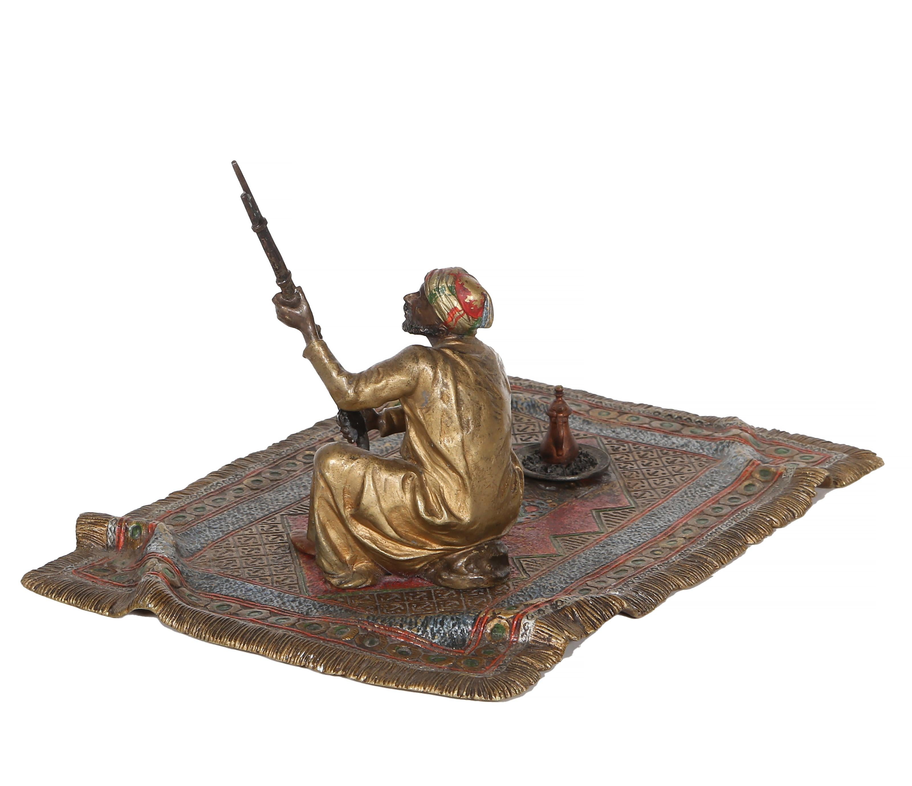 Man on Persian Rug, Orientalist Bronze Sculpture by Franz Bergmann For Sale 6