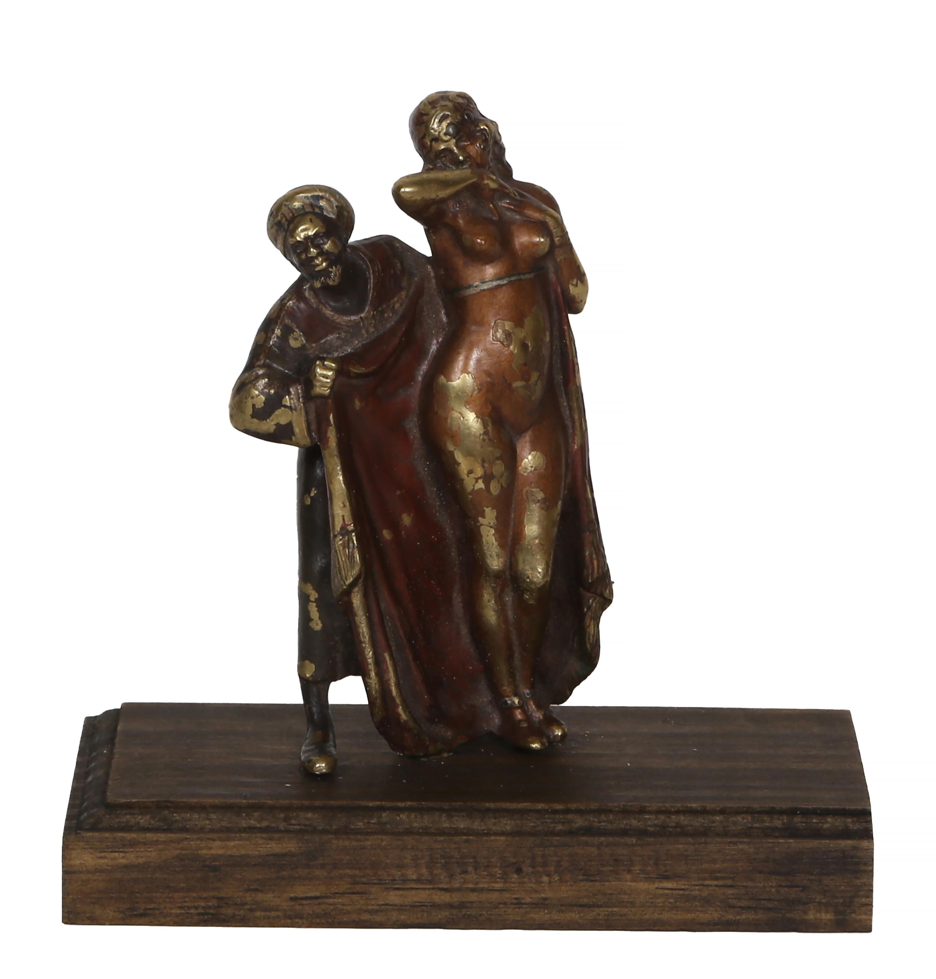 Franz Bergmann, Austrian (1861 -1936) - Slave Trader, Year:  circa 1900, Medium:  Bronze sculpture on wooden base, Size:  5.25 x 3 x 3 in. (13.34 x 7.62 x 7.62 cm), Description:  "Real bronze" and "made in Austria" inscribed on verso