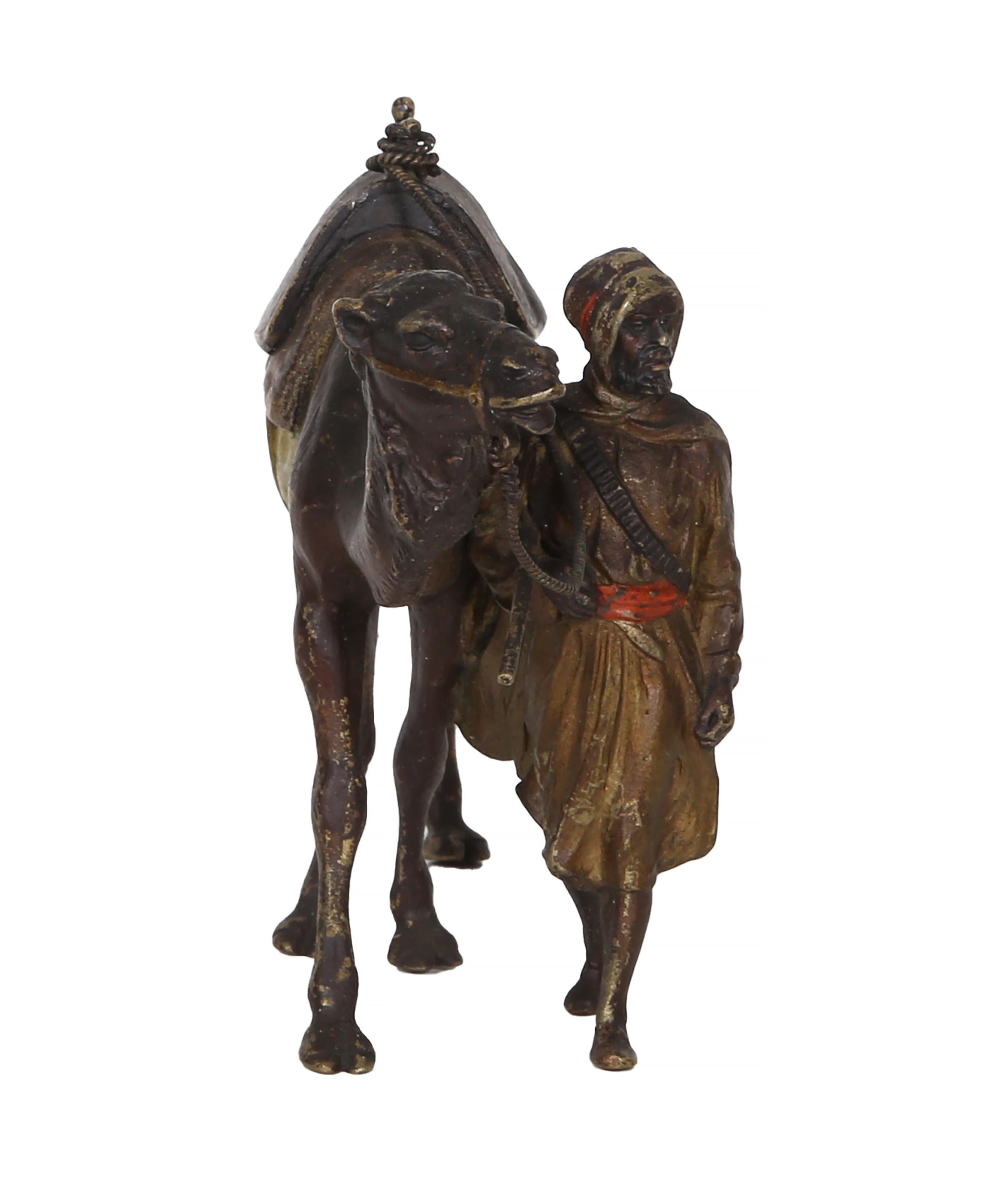 Franz Bergmann, Austrian (1861 -1936) - Traveler with Camel, Year:  circa 1900, Medium:  Cold painted Bronze sculpture, Size:  4.75 x 6 x 3 in. (12.07 x 15.24 x 7.62 cm)