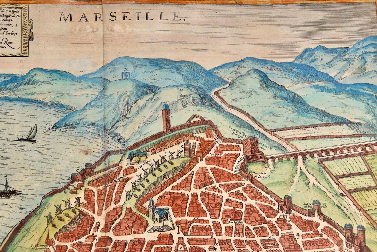 This is a 16th century original hand-colored copperplate engraved map of Marseilles, France entitled 