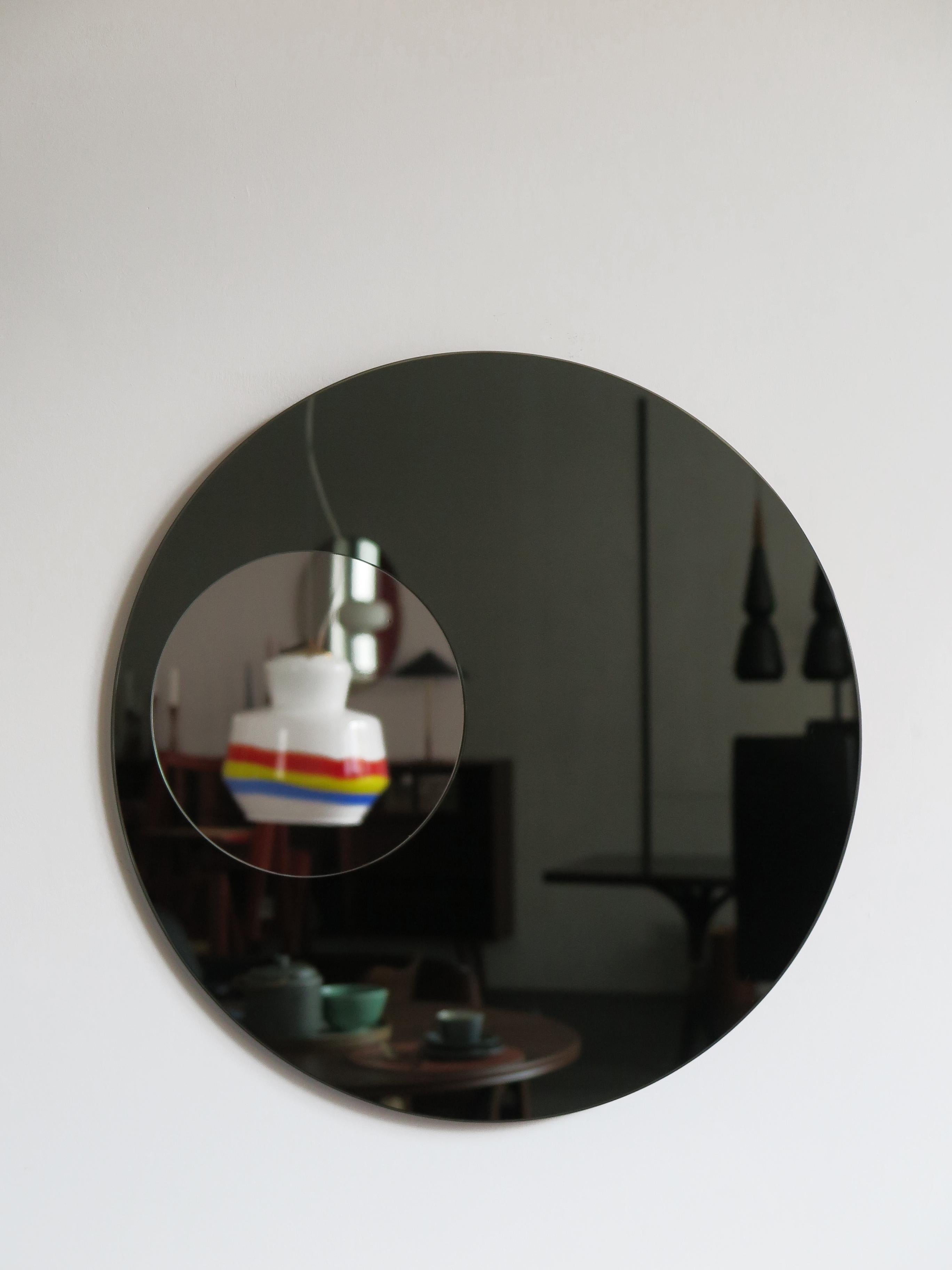 Italian midcentury modern design round wall mirror designed by Franz J. Sartori and produced by Cristal art, 1960s.