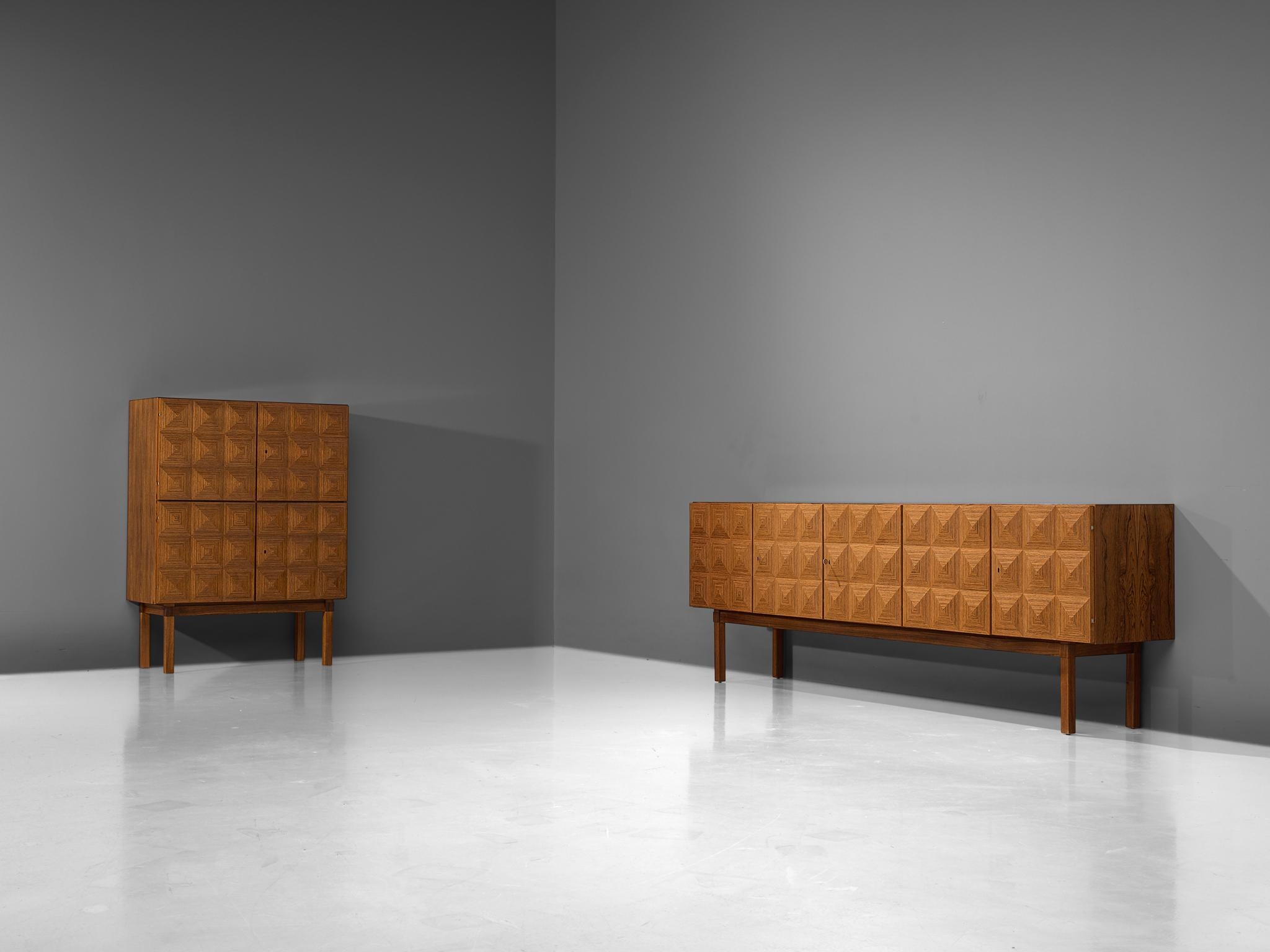 Franz Meyer, set of highboard and sideboard, rosewood, Germany, 1960s

Subtle ‘brutal looking’ highboard and sideboard by master furniture maker Franz Meyer from the 1960s. The doors of these cabinets feature a diamond-shaped structure, which